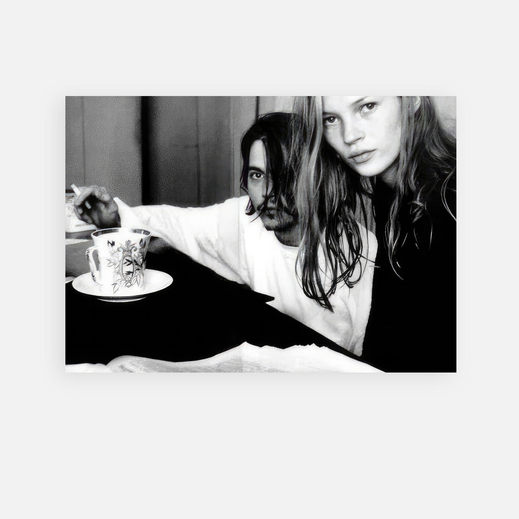 Johnny Depp and Kate Moss black-and-white poster, capturing 90s rock-and-roll romance.