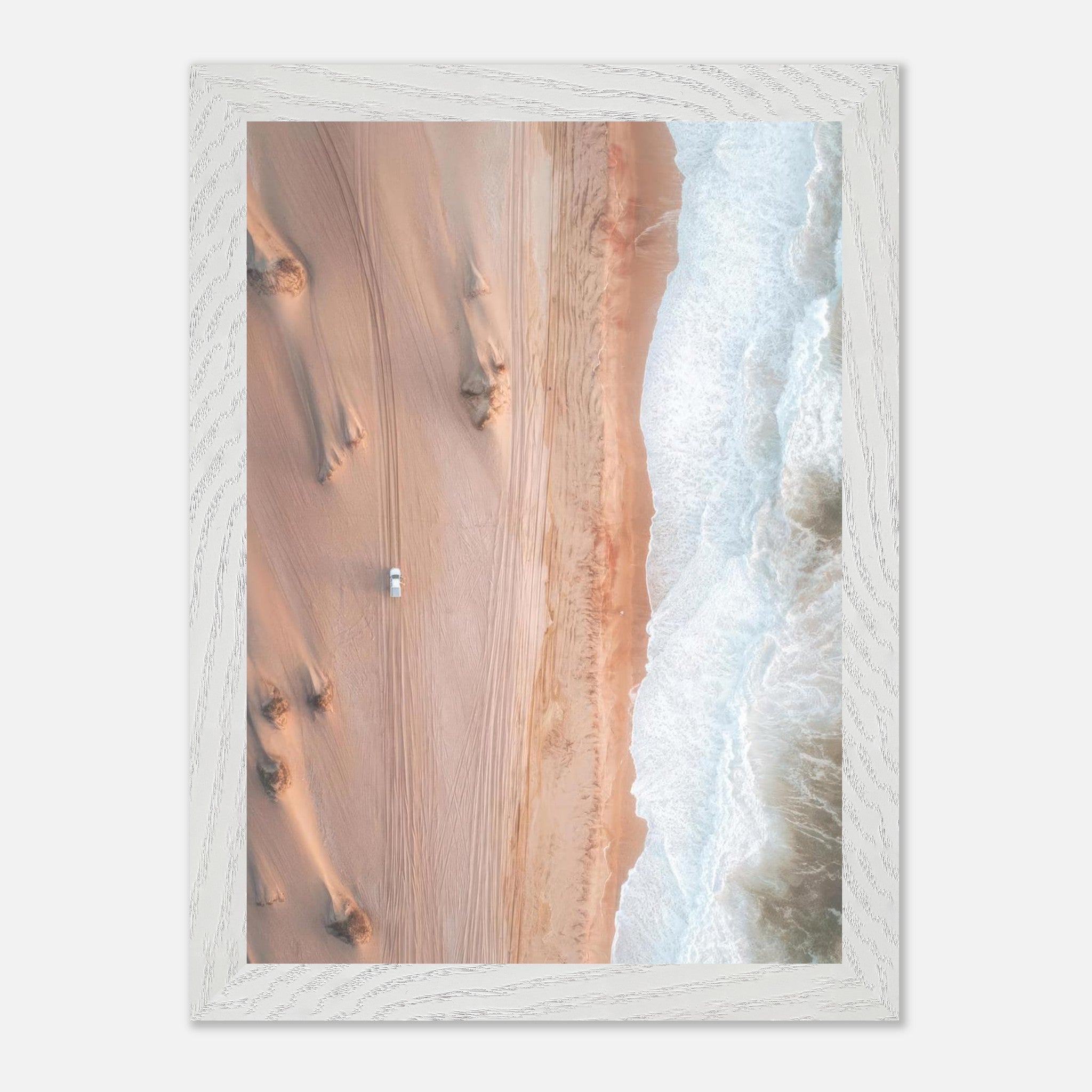 Drone photography print showcasing desert dunes meeting ocean waves in a vintage framed design.