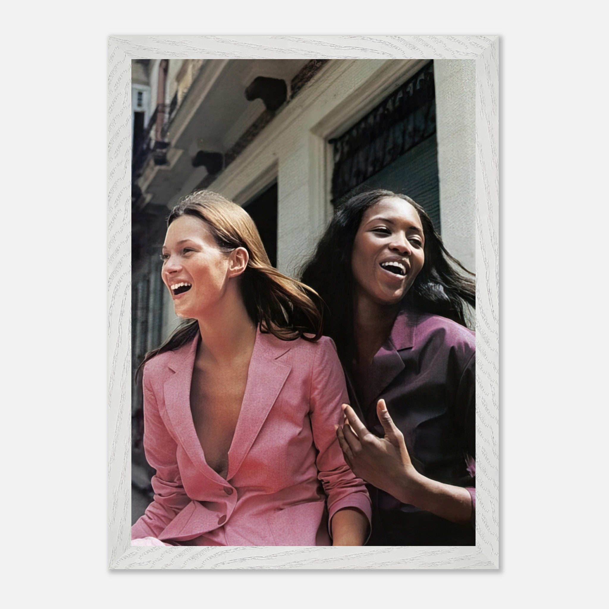 Naomi Campbell x Kate Moss vintage framed print showcasing iconic supermodels in stylish attire.