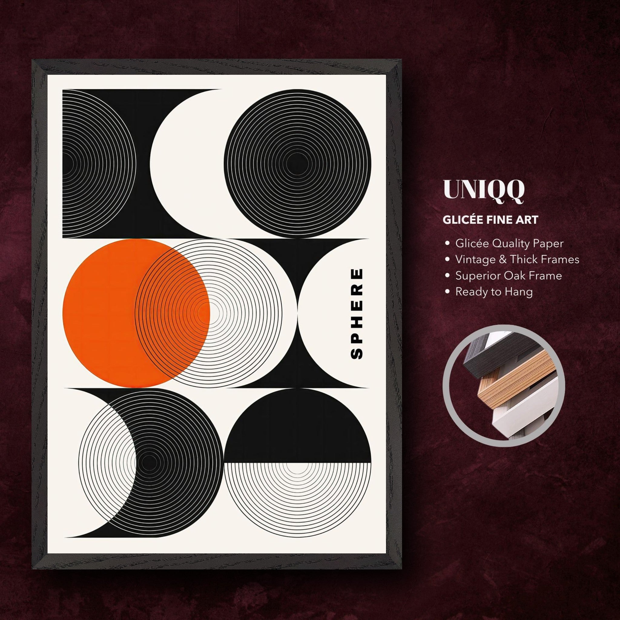 Abstract geometric sphere art print in black and white with orange accents, framed in oak, ready to hang.