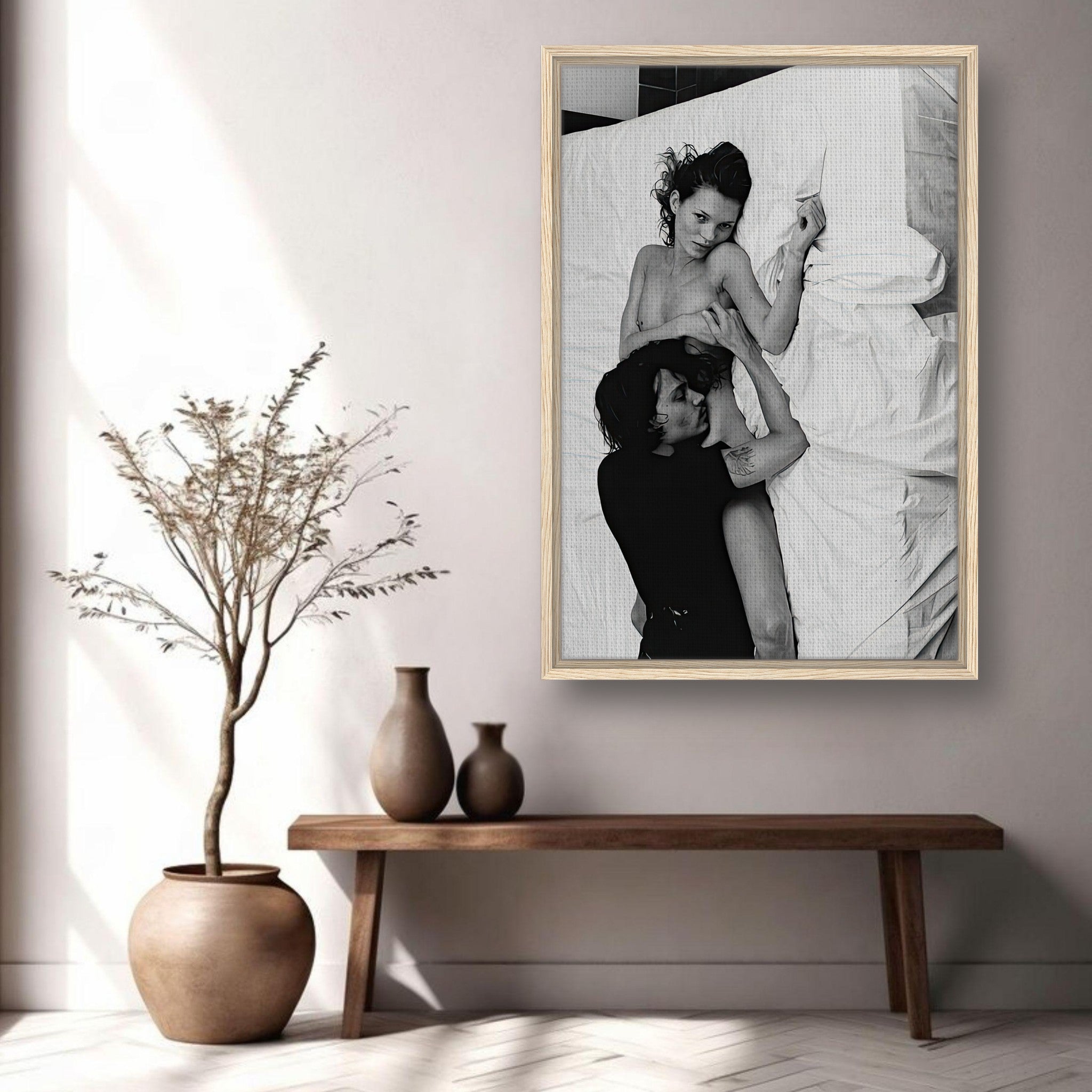Black-and-white framed canvas print of Kate Moss and Johnny Depp embracing, capturing 1994's iconic romance.