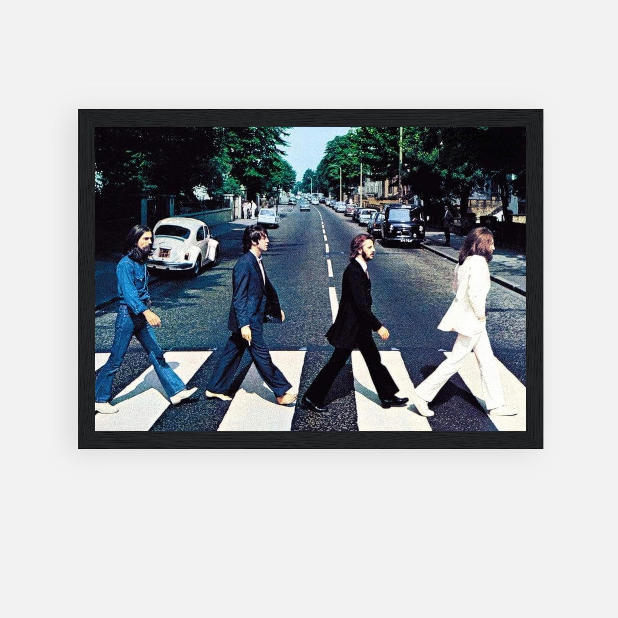 Framed print of The Beatles crossing Abbey Road, showcasing iconic album art in vibrant colors.