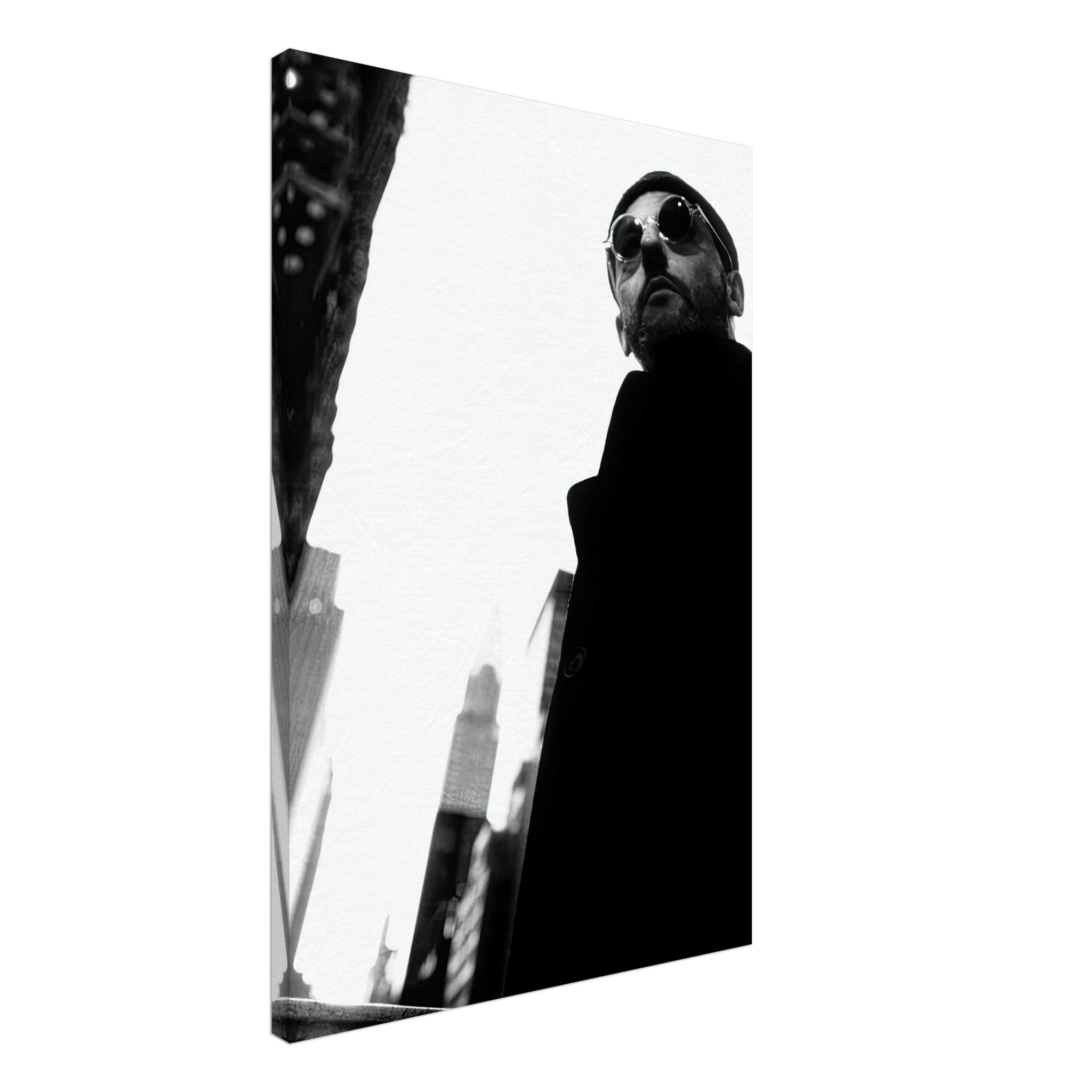 Black-and-white canvas artwork featuring a man in sunglasses against an urban backdrop.