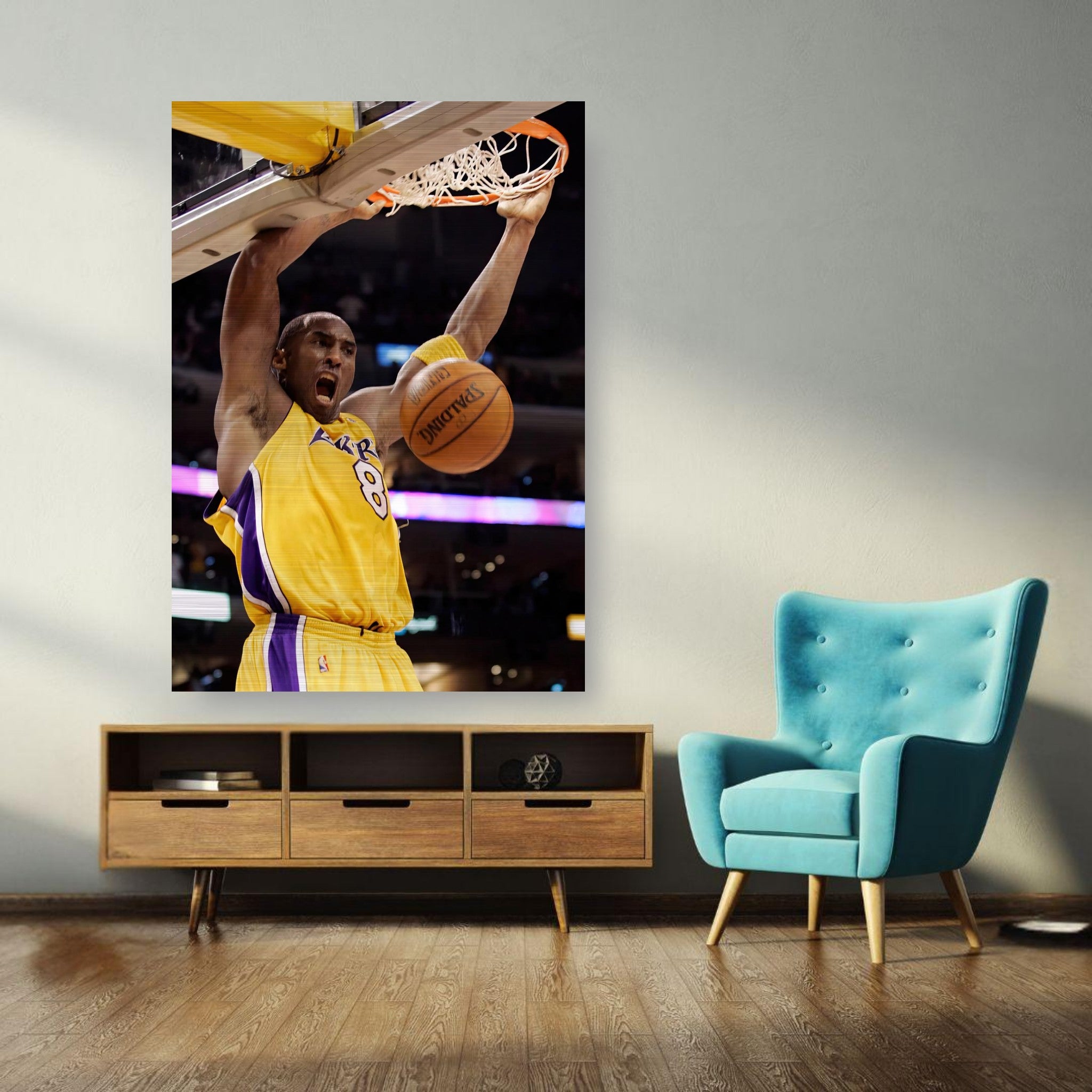 Kobe Bryant mid-air slam dunk Brushed Metal print in a modern living room setting with blue chair.