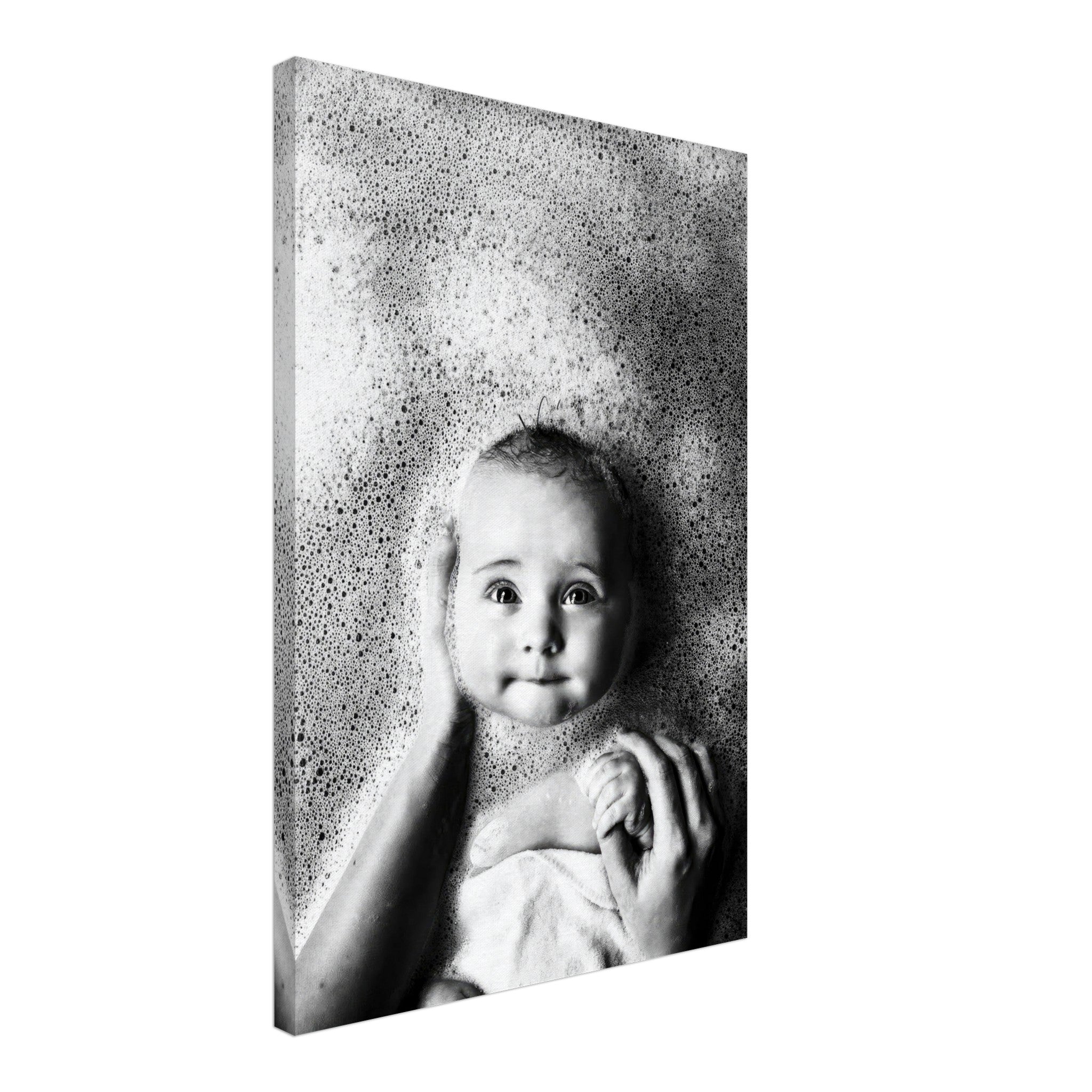 Black-and-white baby bath photography canvas print featuring a smiling baby surrounded by bubbles.