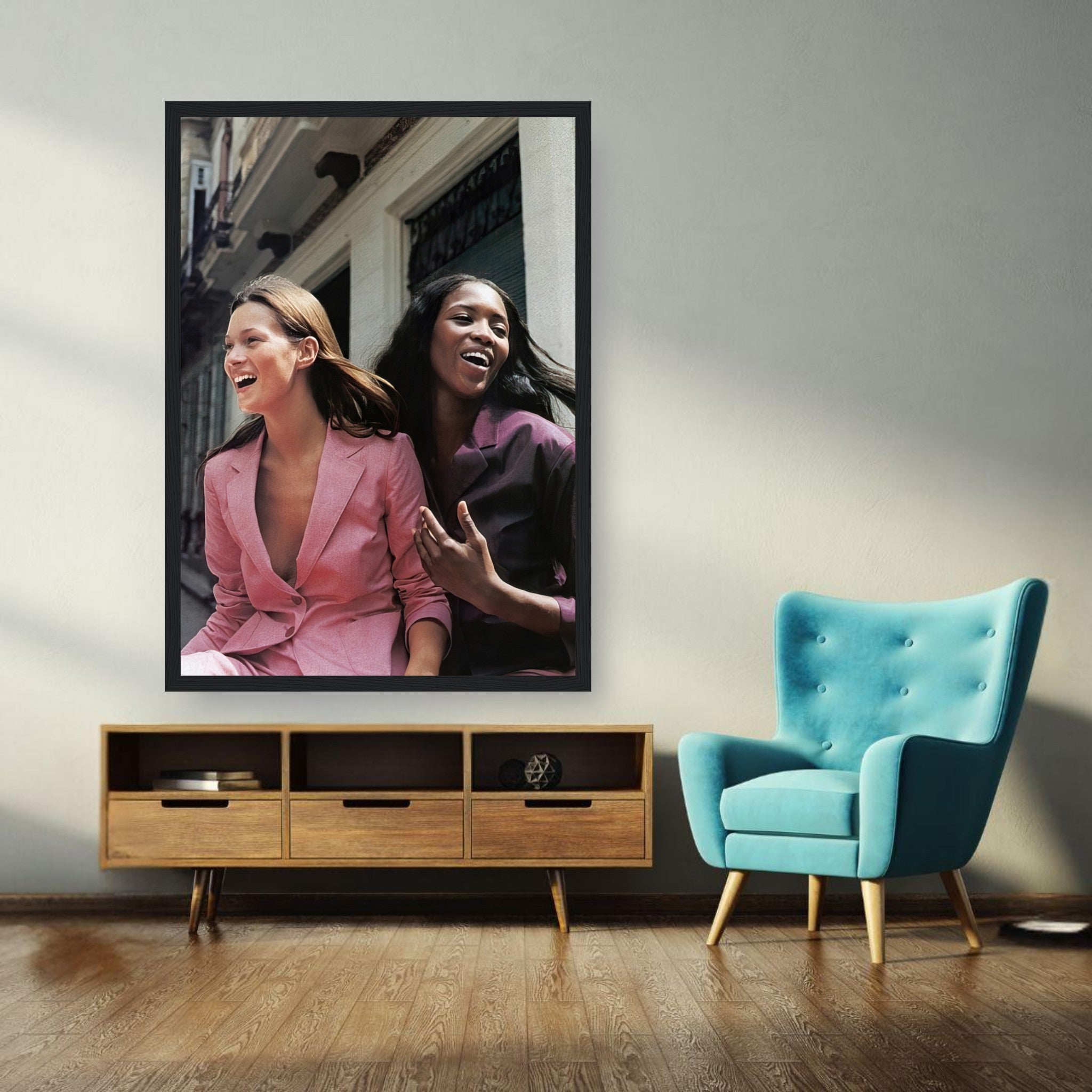 Naomi Campbell and Kate Moss framed print capturing a joyful fashion moment in a stylish interior.