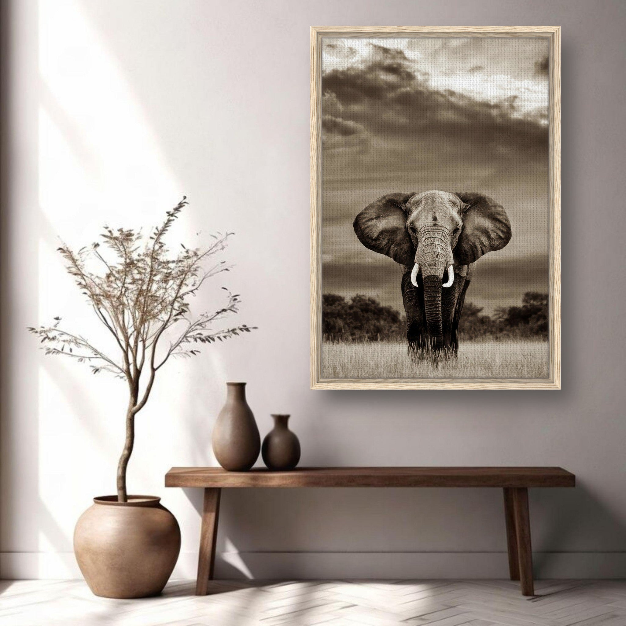 Elegant framed canvas print of a majestic elephant portrait in monochrome, displayed in a stylish interior.