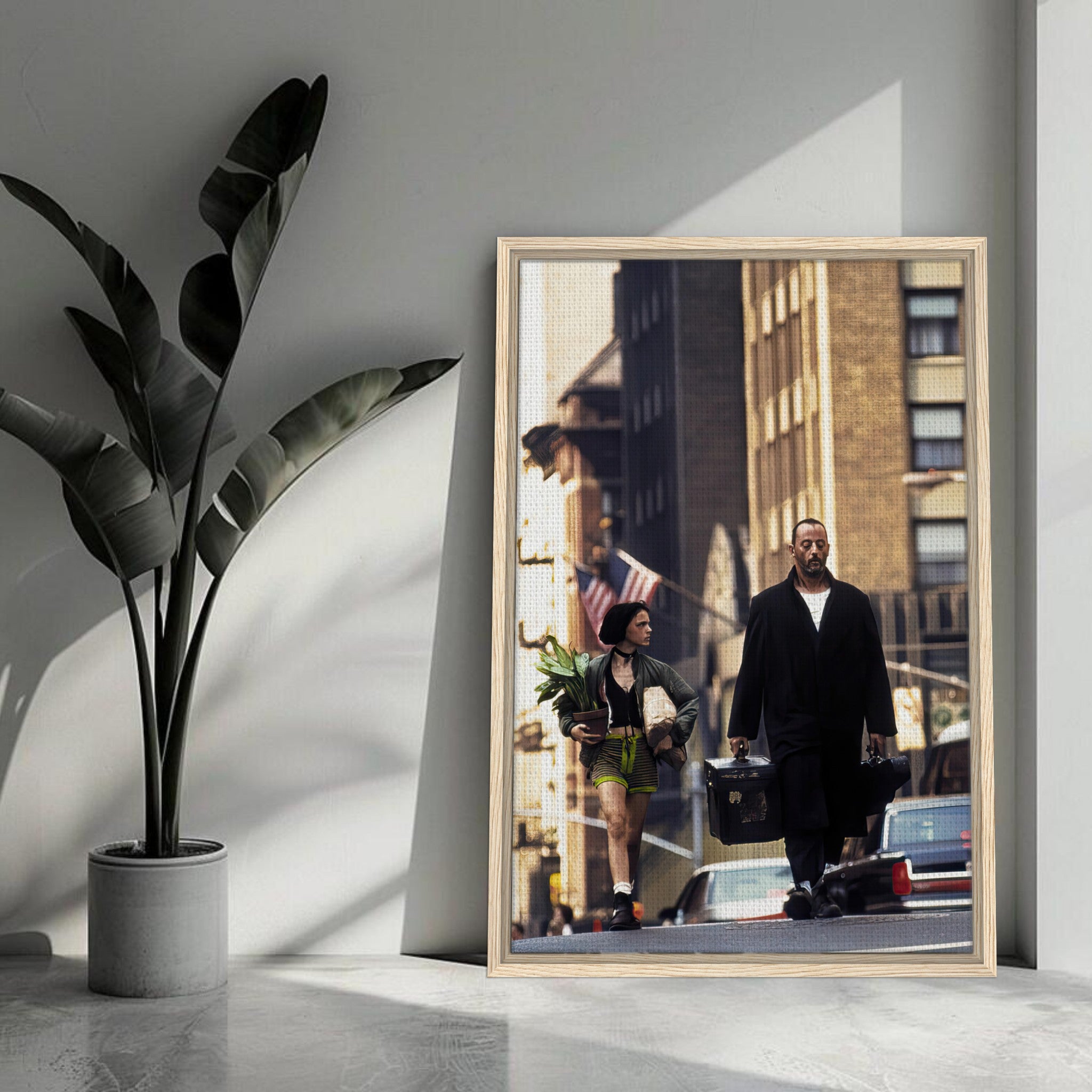 Jean Reno and Natalie Portman in a framed canvas print from *Leon: The Professional*, showcasing their iconic characters.