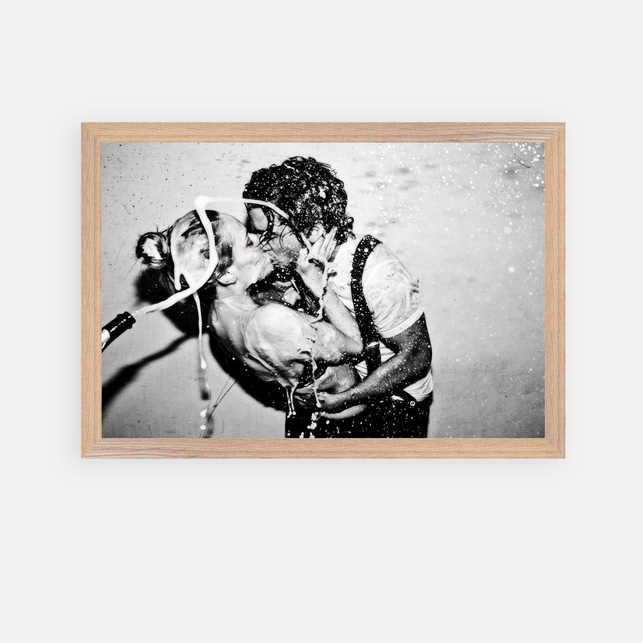 The Champagne Kiss fine art print of Johnny Depp and Kate Moss in a passionate kiss, capturing romance and rebellion.