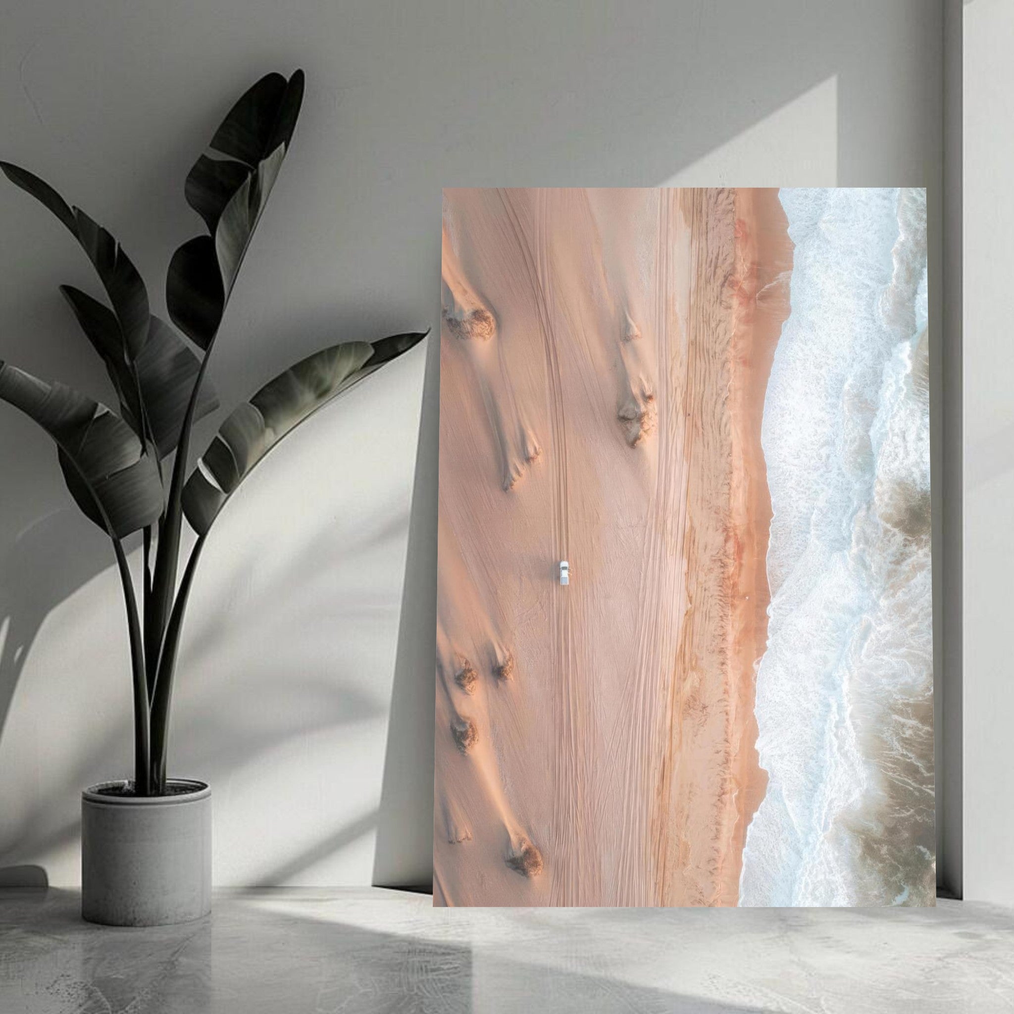 Drone photography metal print showcasing desert sands meeting ocean waves, highlighting nature's stunning contrast.