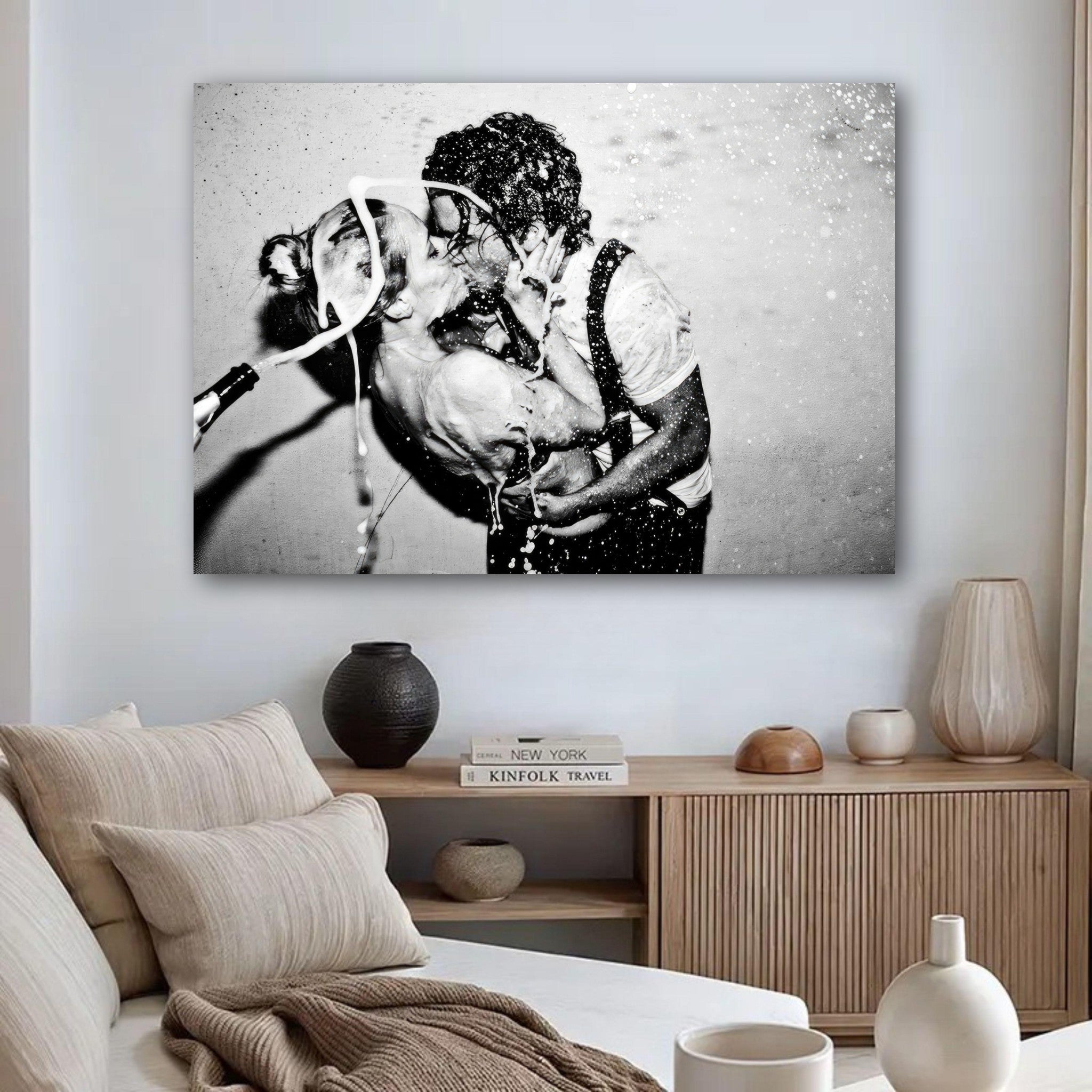 Black-and-white metal print of Johnny Depp and Kate Moss sharing a passionate kiss covered in champagne.