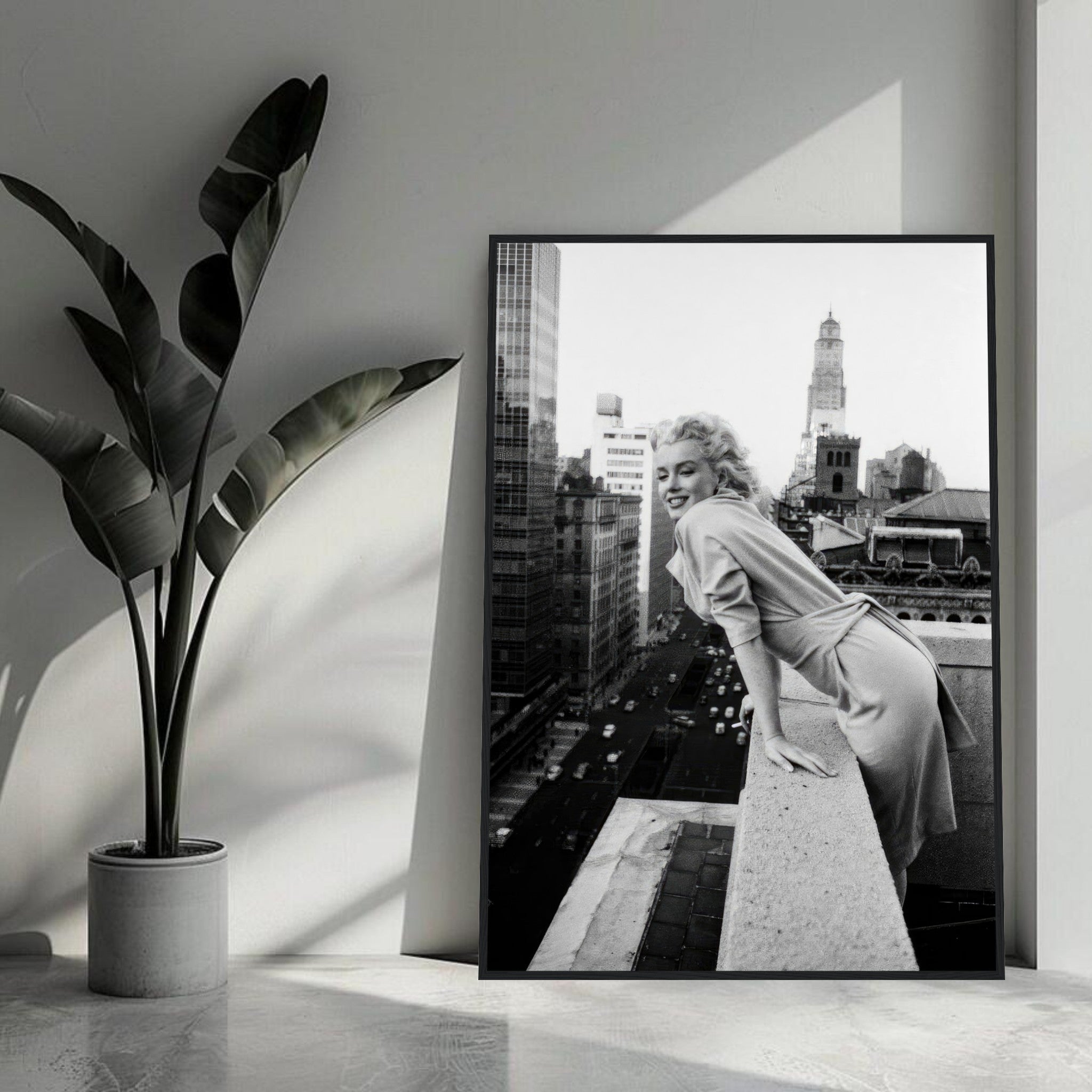 Marilyn Monroe framed print on rooftop with NYC skyline, showcasing vintage charm and elegance in black-and-white.