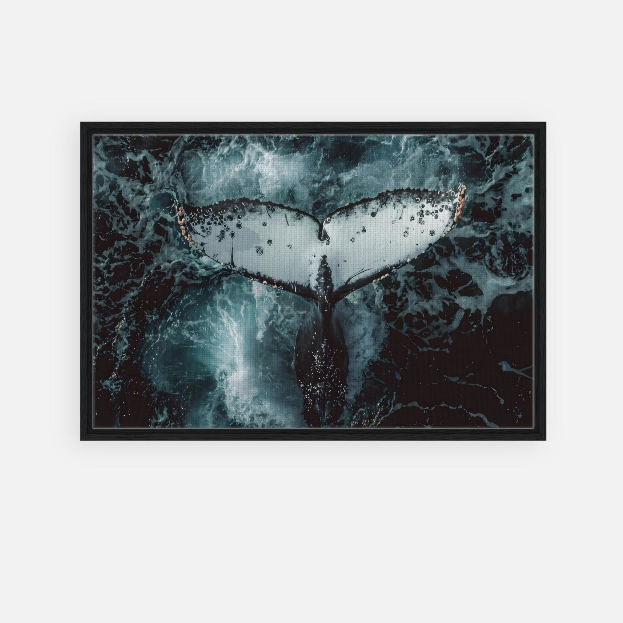 Humpback whale's tail breaking the ocean surface in a framed canvas print, showcasing marine beauty.