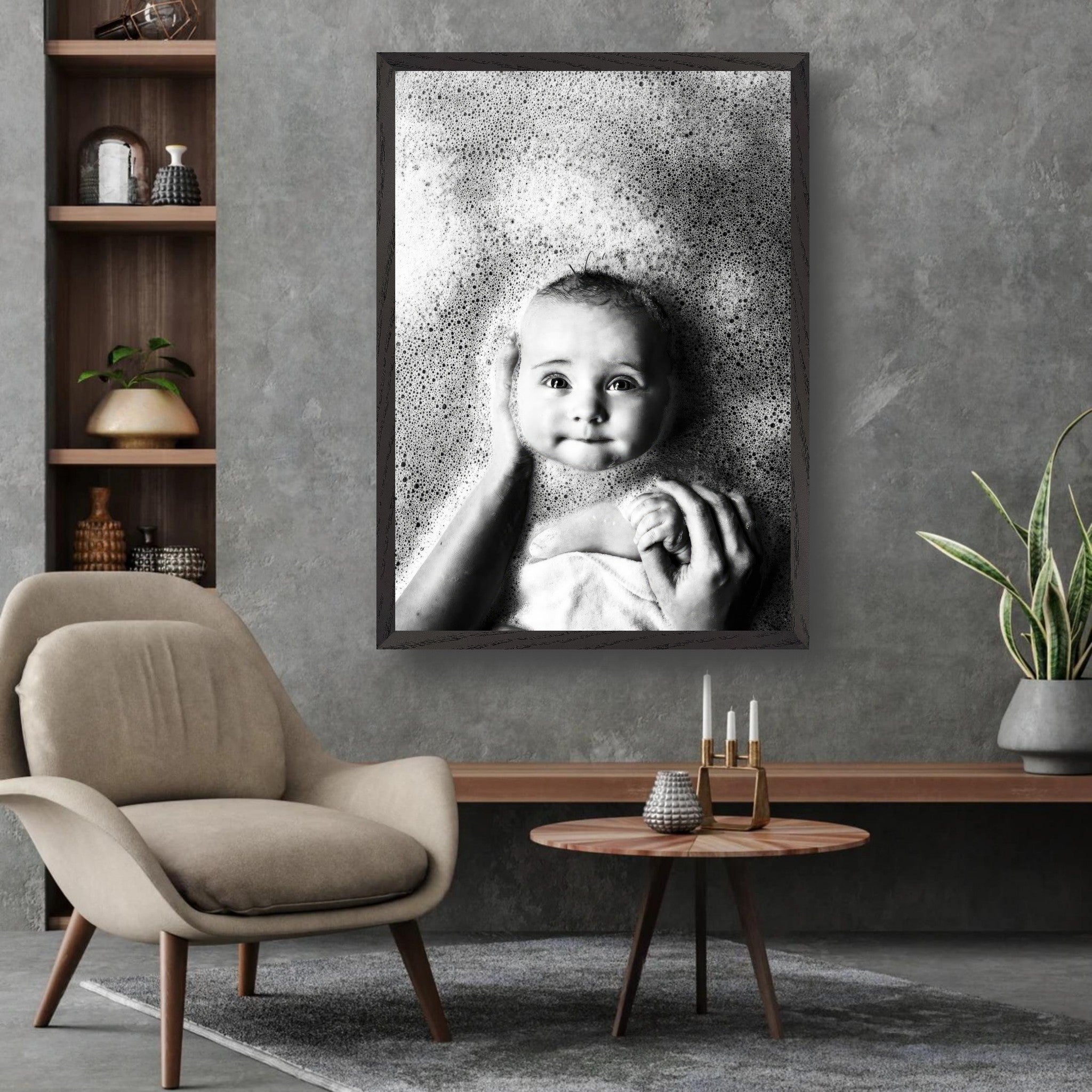 Black-and-white baby bath photography art print capturing a smiling baby surrounded by bubbles, framed in a modern interior.