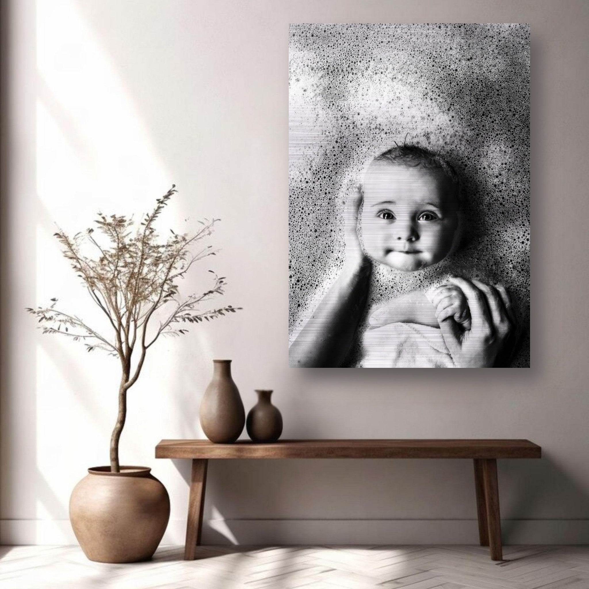 Stunning black and white baby bath photography on brushed metal, featuring a joyful baby surrounded by bubbles.