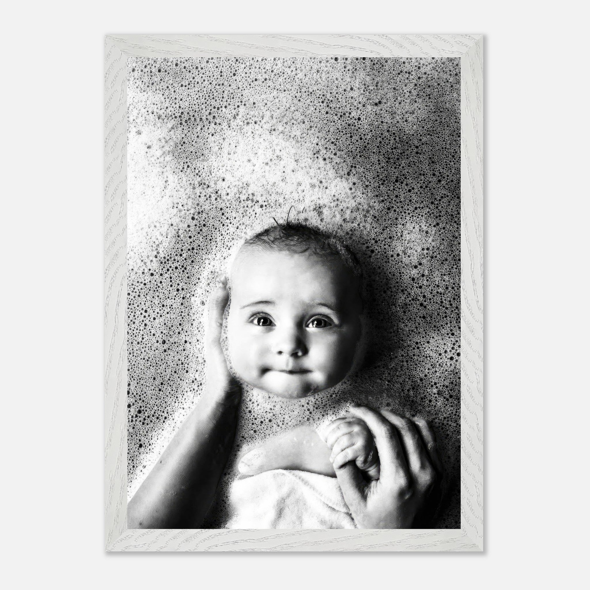 Vintage framed print of a smiling baby in a bubble bath, capturing the innocence of childhood.