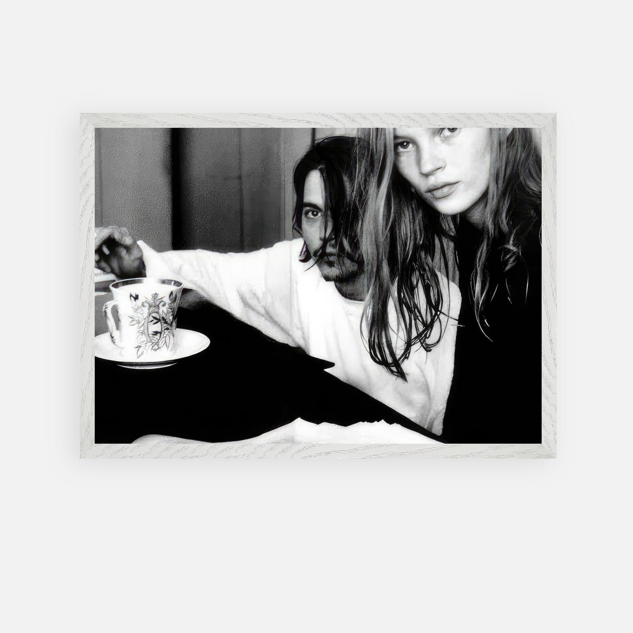 Black-and-white fine art print of Johnny Depp and Kate Moss capturing 90s rebellion and romance.