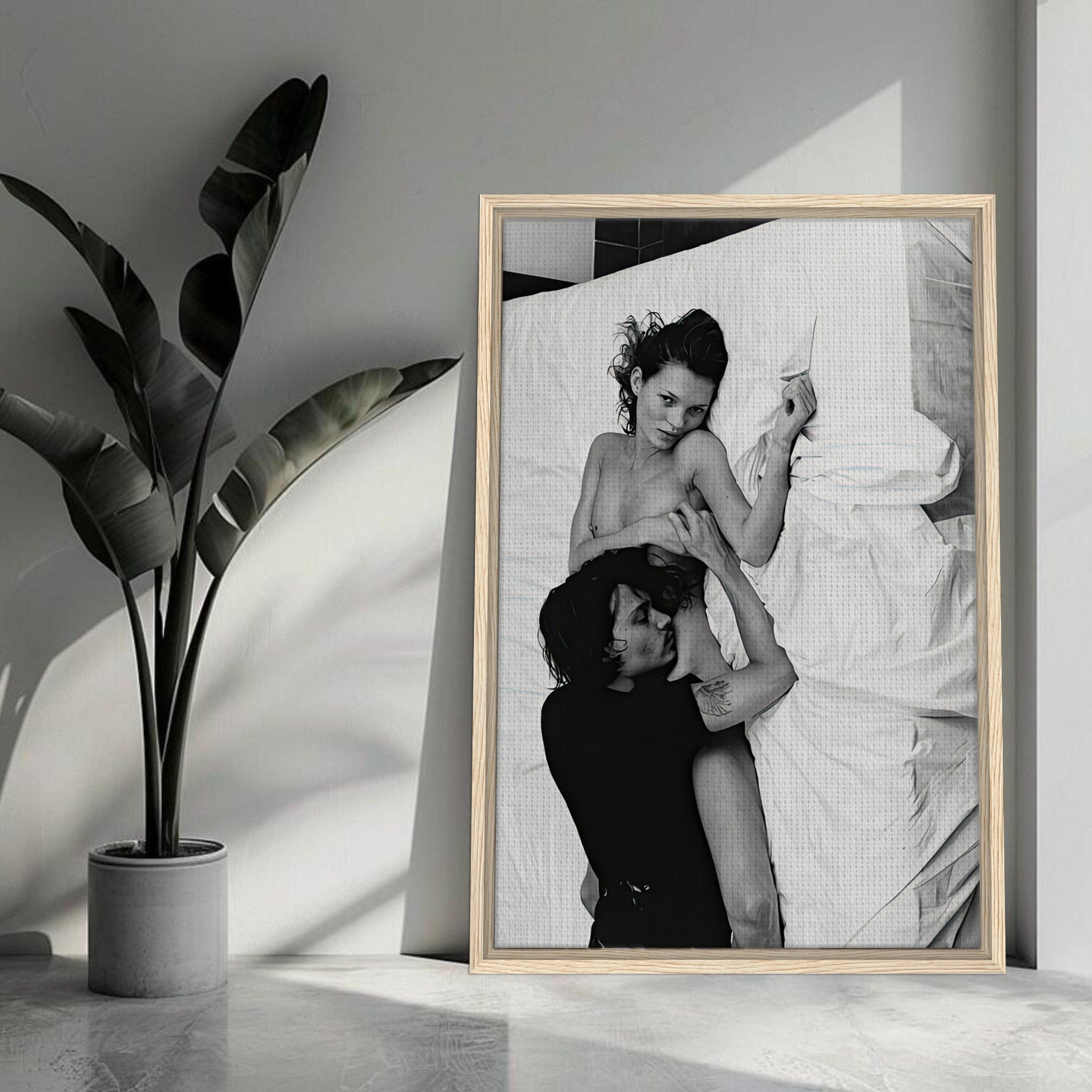Framed black-and-white canvas print of Kate Moss and Johnny Depp, capturing 90s romance and allure.