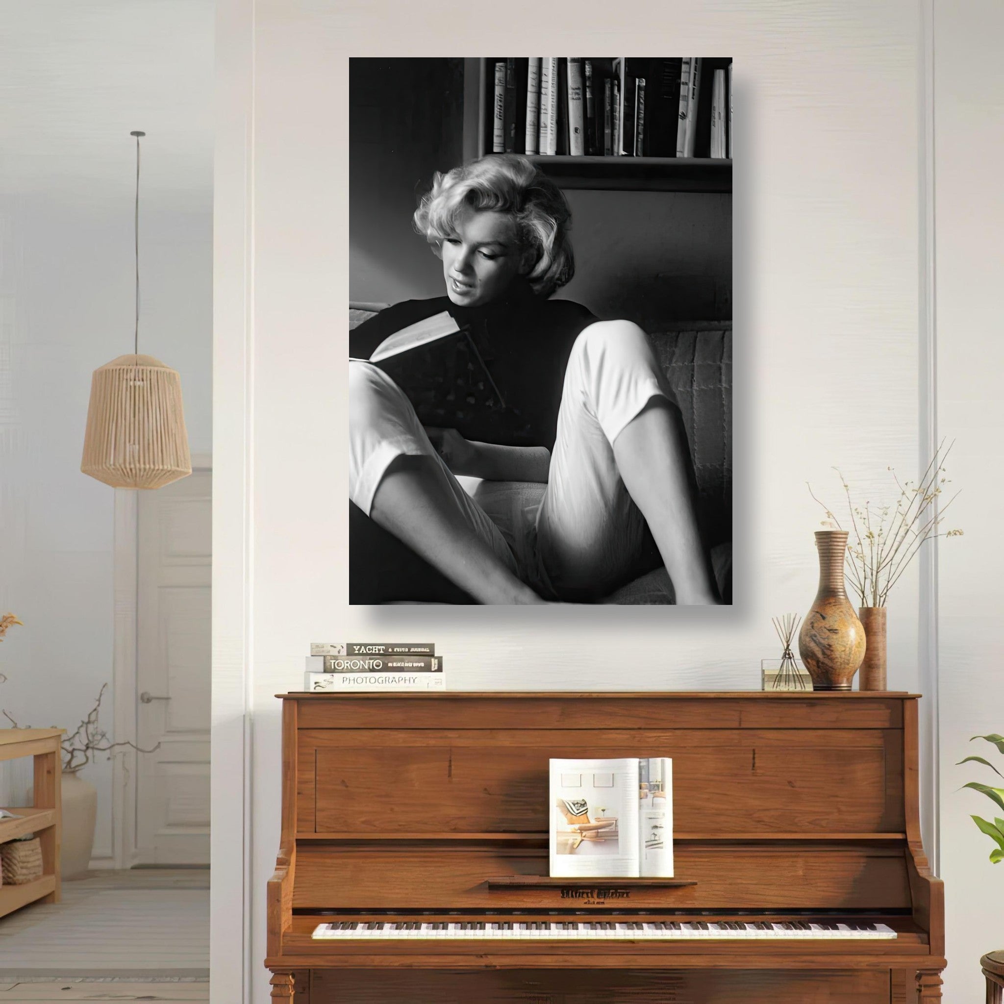 Marilyn Monroe reading at home, elegant black-and-white metal print, adds Hollywood allure to any space.