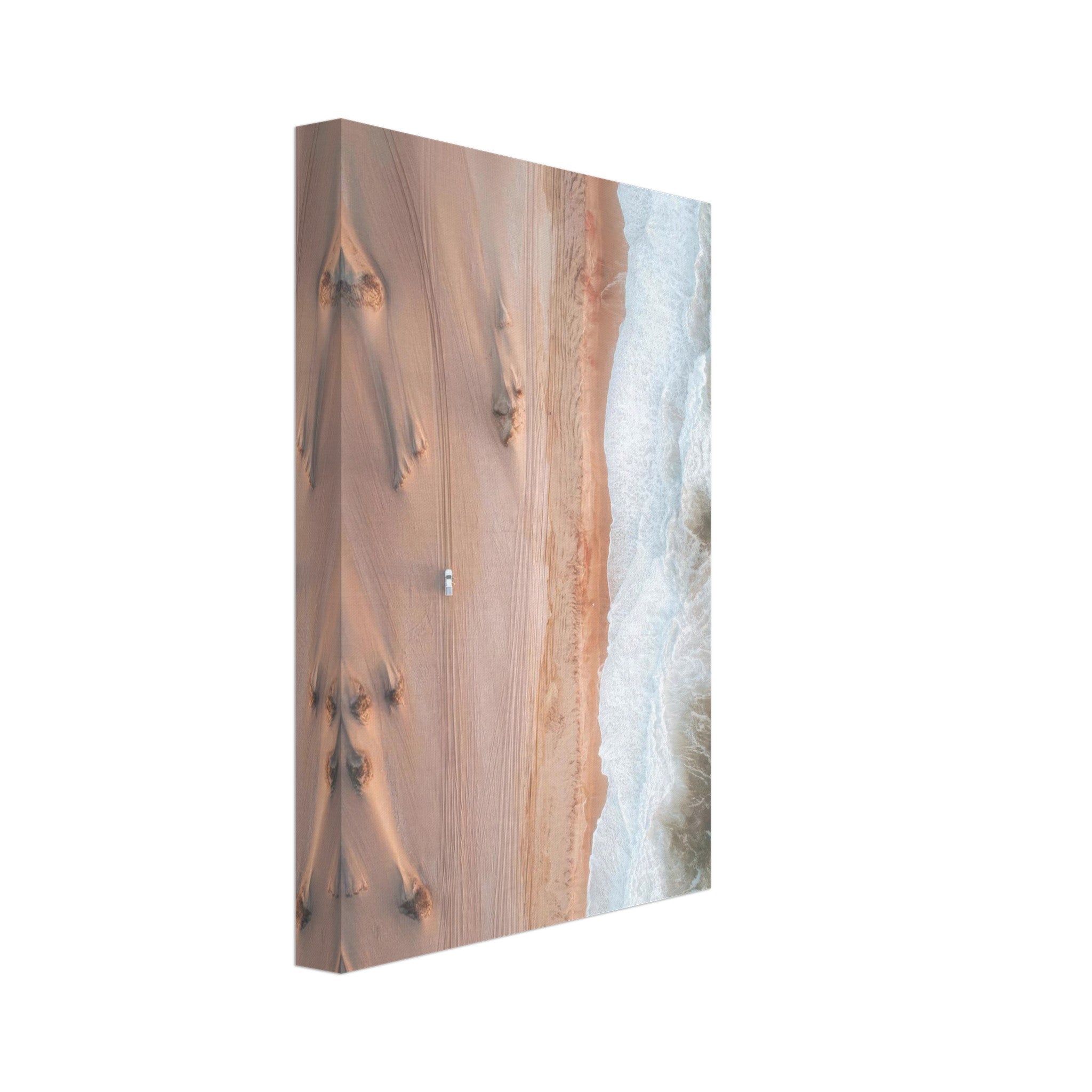 Drone photography canvas print of desert sand dunes meeting ocean waves, showcasing stunning natural contrasts and colors.