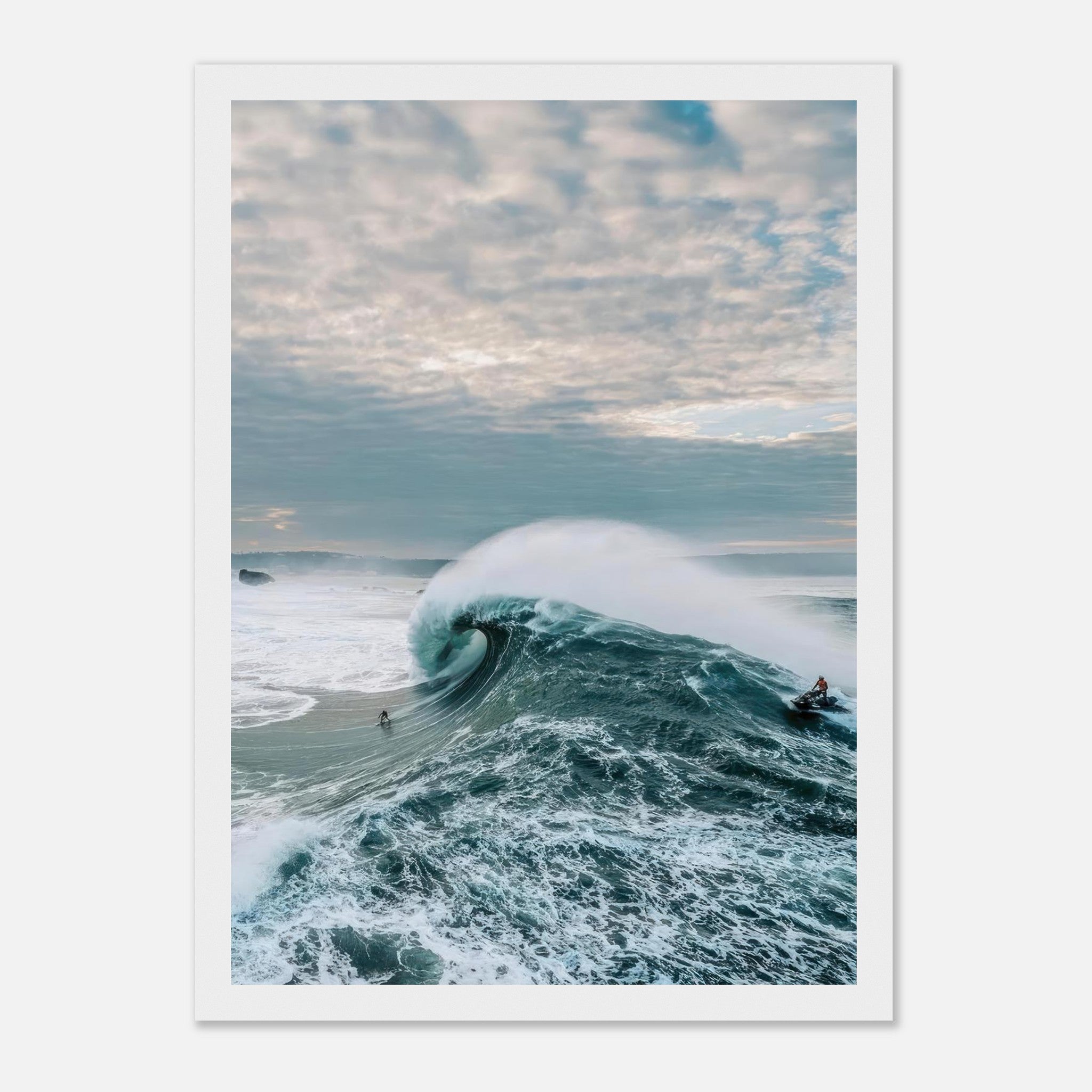 Framed print of a surfer riding a massive wave under a dramatic sky, showcasing the thrill of big wave surfing.