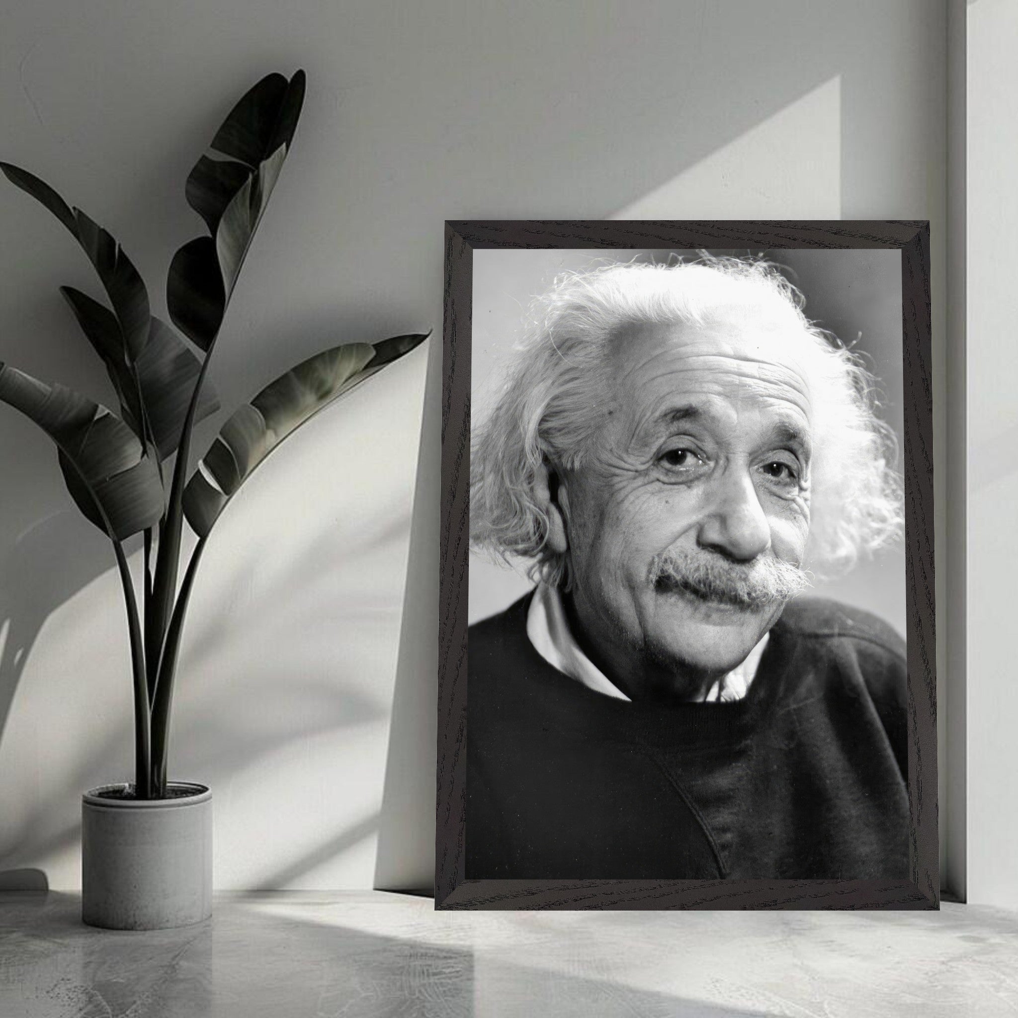 Vintage framed print of Albert Einstein in black-and-white, capturing his warmth and contemplation from 1946.