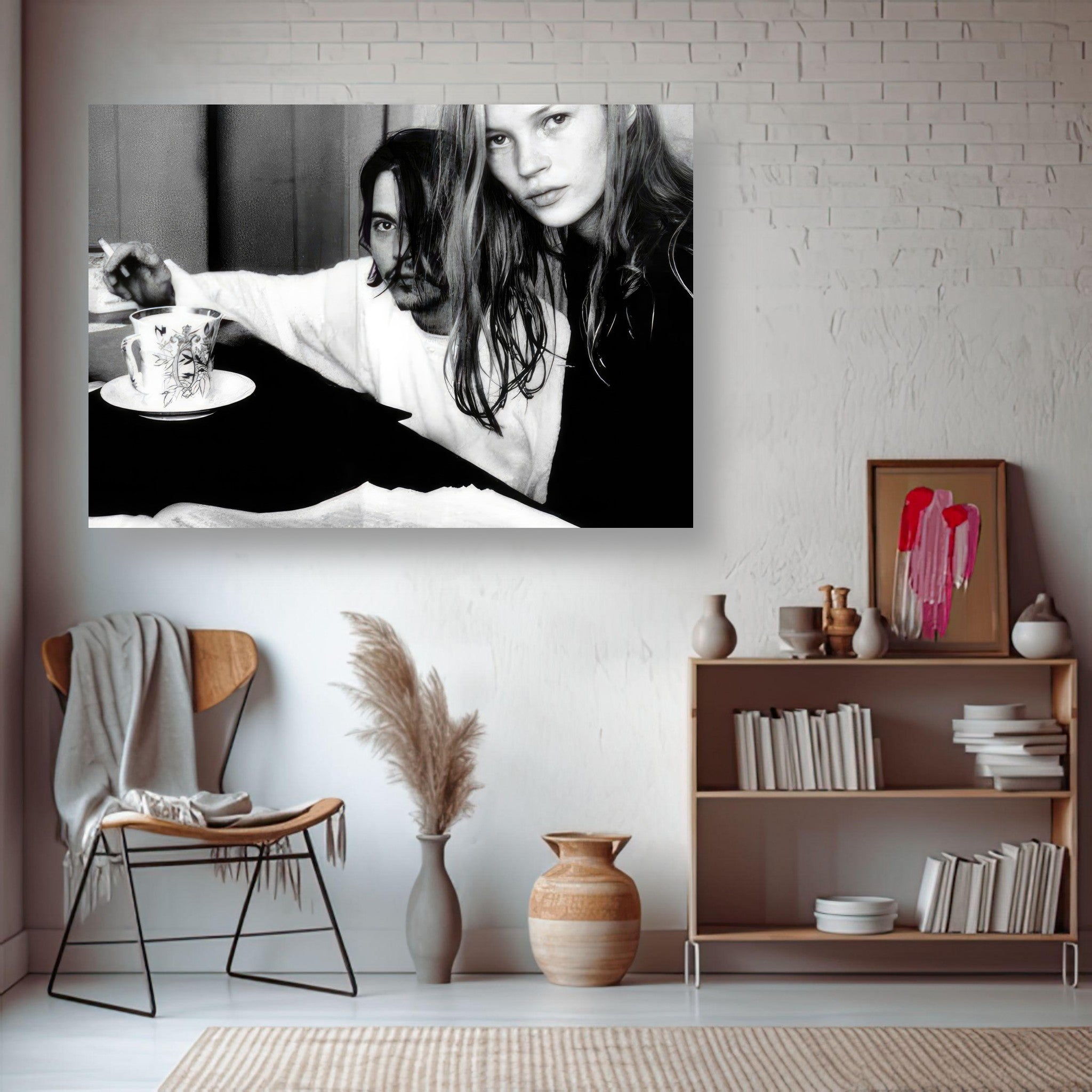 Black and white metal print of Johnny Depp and Kate Moss capturing '90s romance, displayed in a stylish home interior.