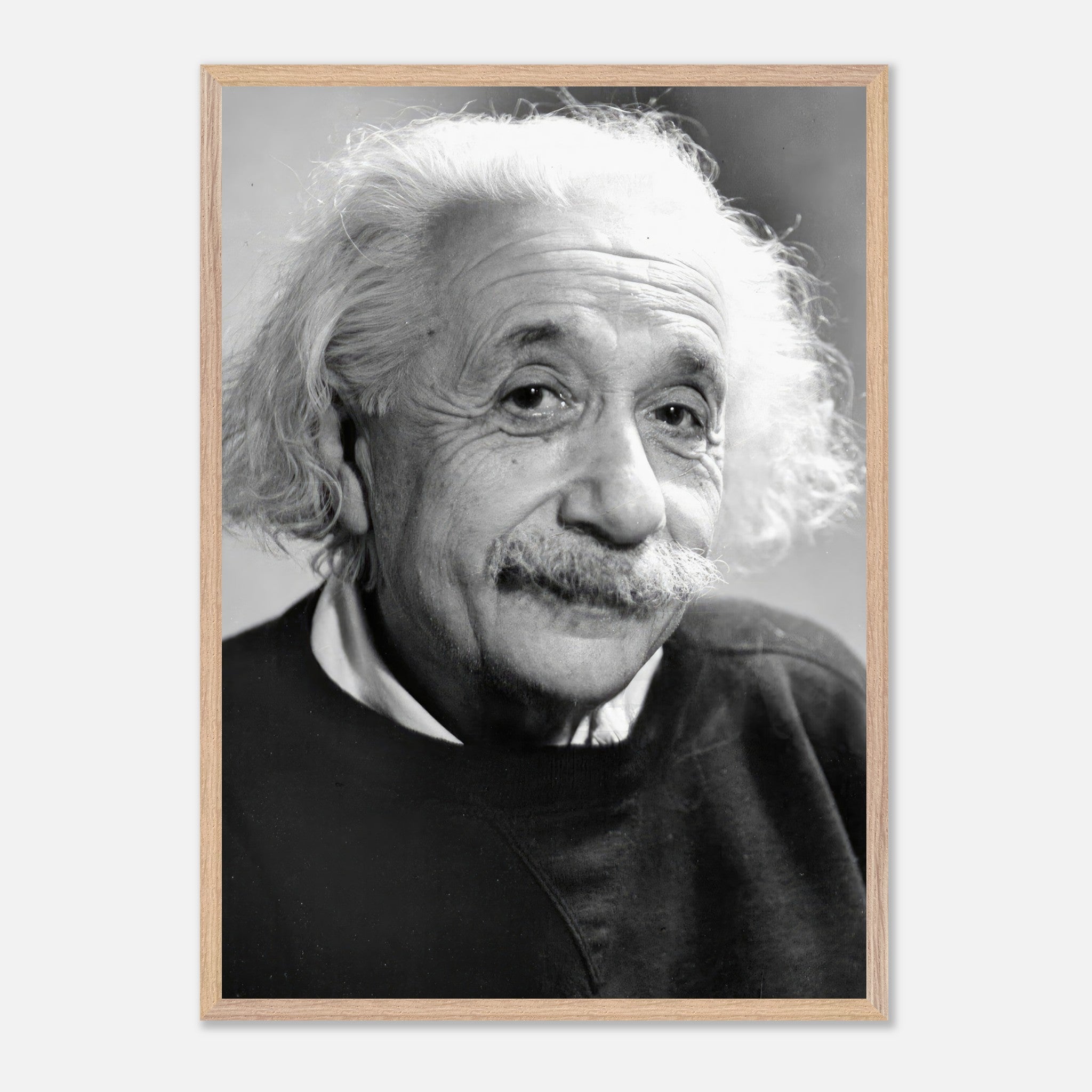 Vintage framed print of Albert Einstein from 1946, showcasing warmth and contemplation in black-and-white.