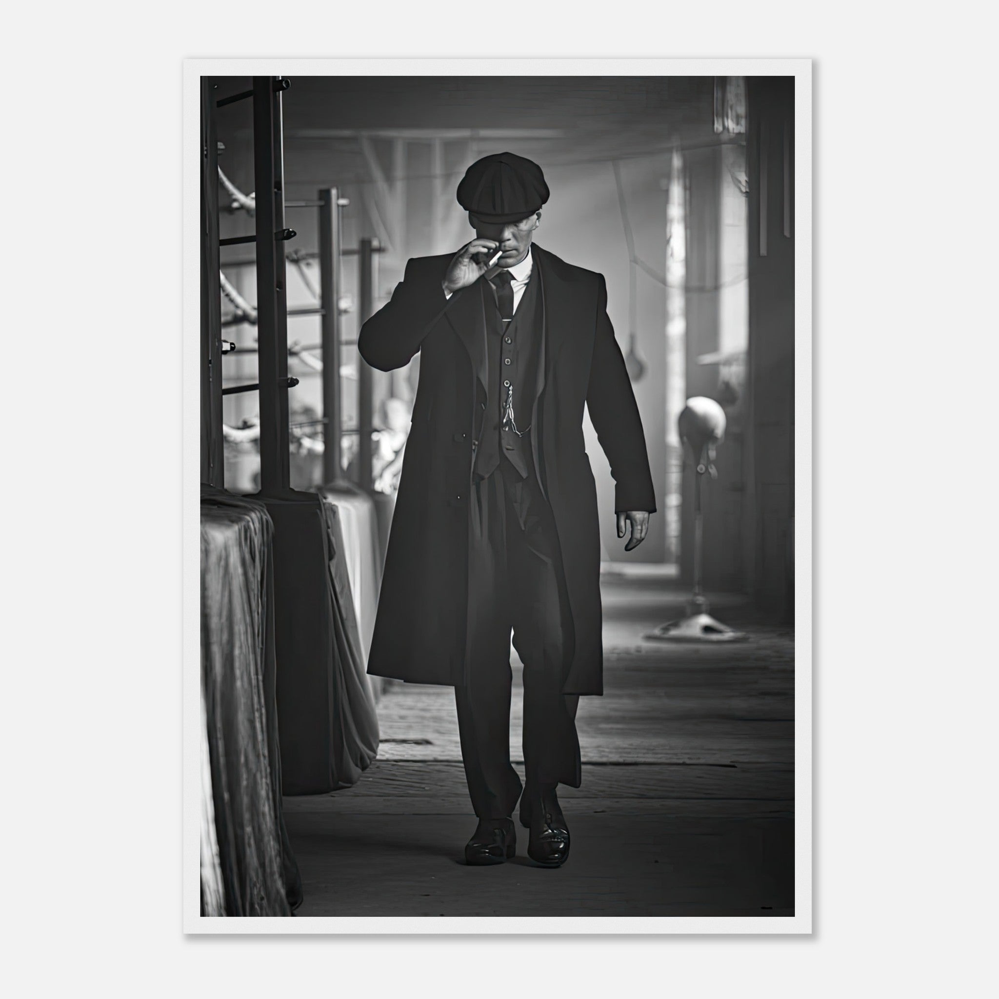 Tommy Shelby in classic attire from Peaky Blinders, framed black-and-white print capturing 1920s Birmingham elegance.