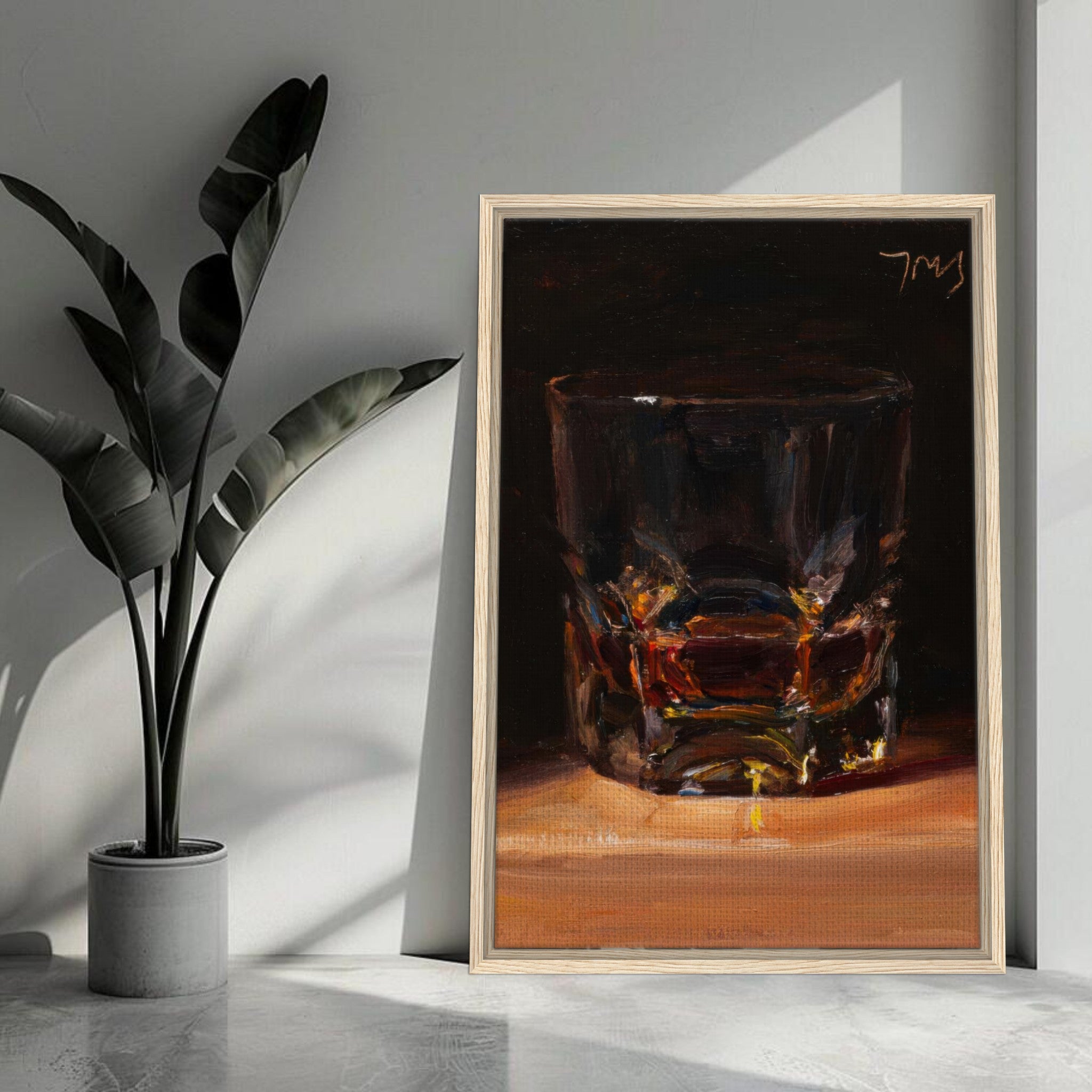 Framed canvas print of a whiskey glass showcasing rich amber hues and elegant brushstroke details.