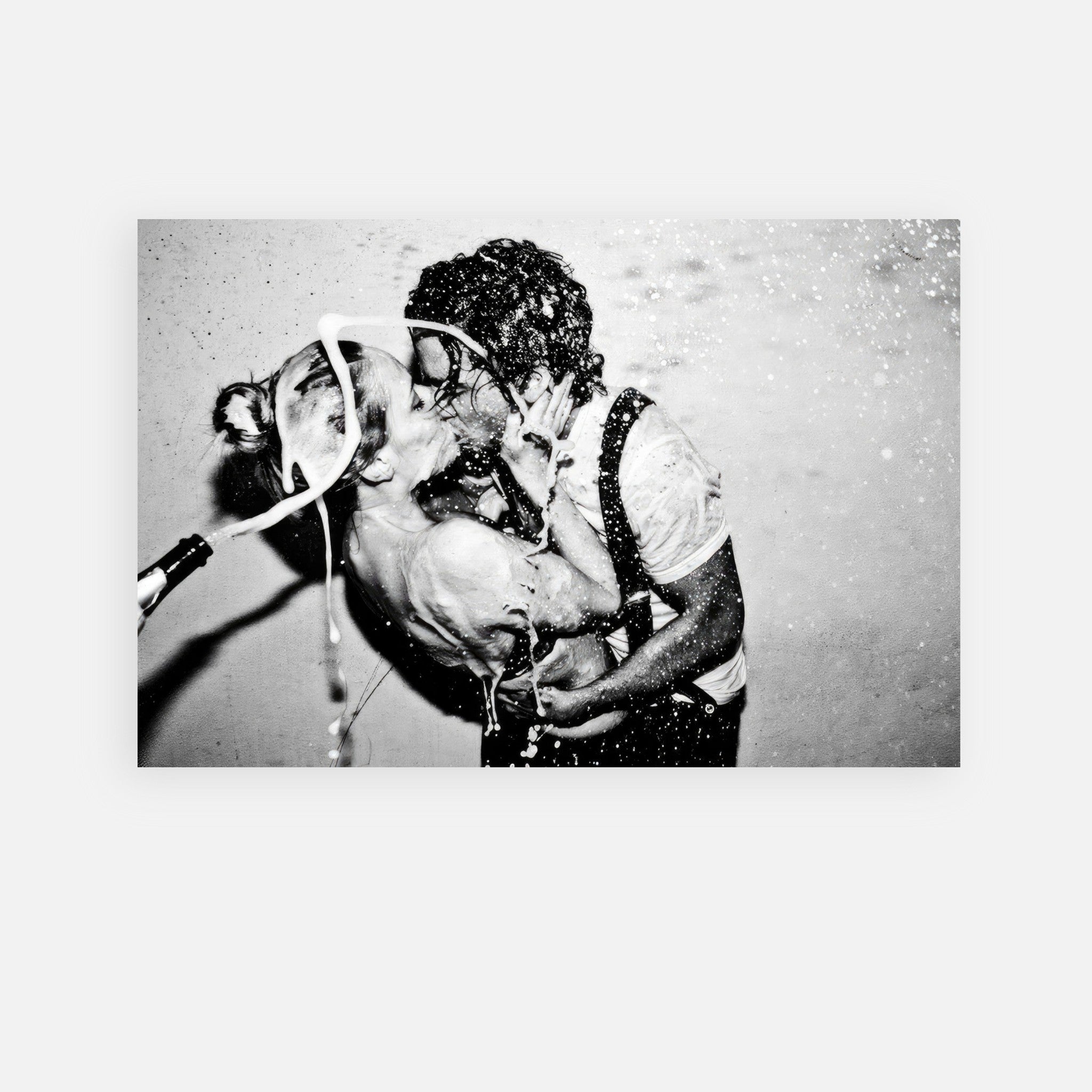 The Champagne Kiss metal print featuring Johnny Depp and Kate Moss in a passionate embrace with champagne splashes.