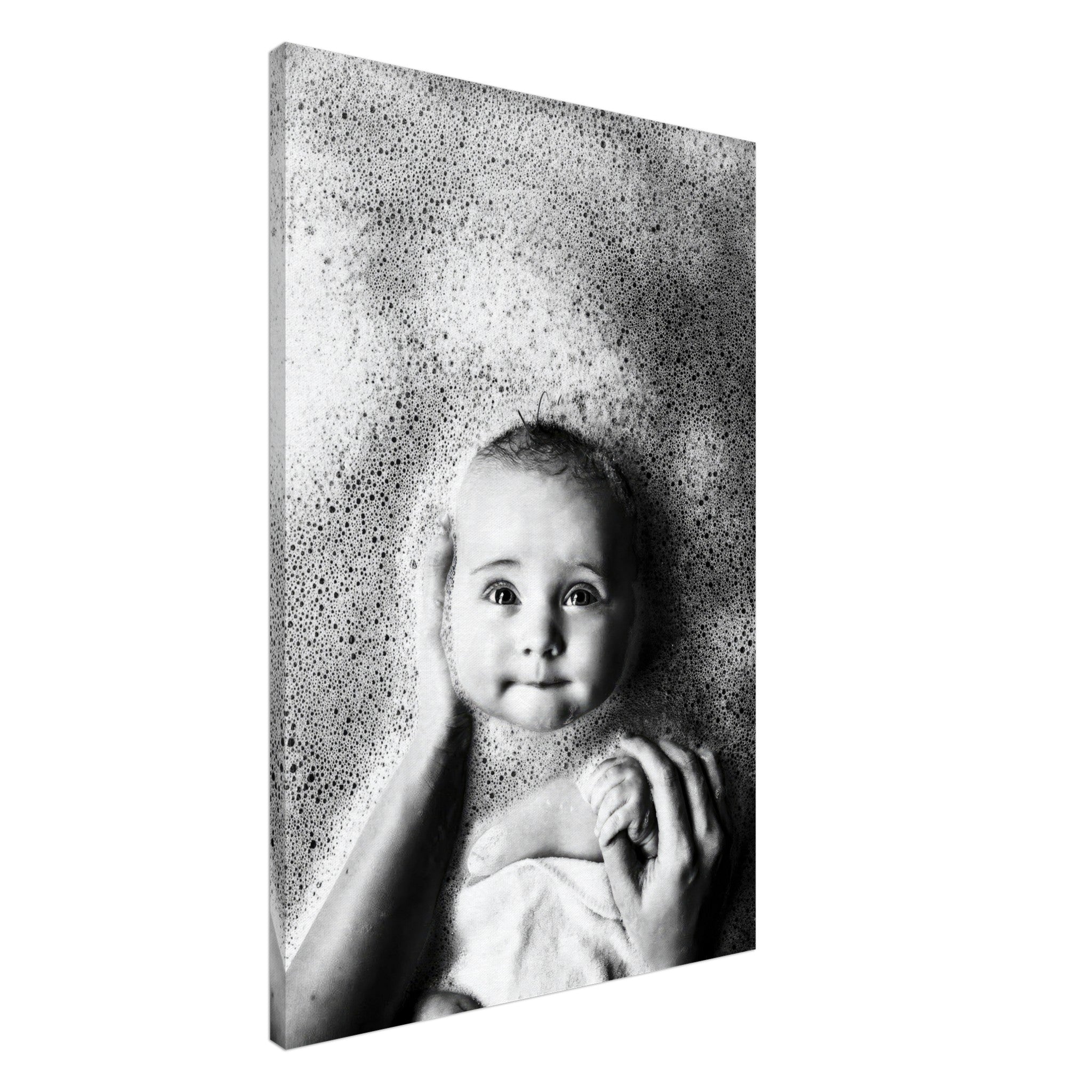 Black and white canvas print of a baby enjoying bath time, surrounded by bubbles, evoking joy and nostalgia.