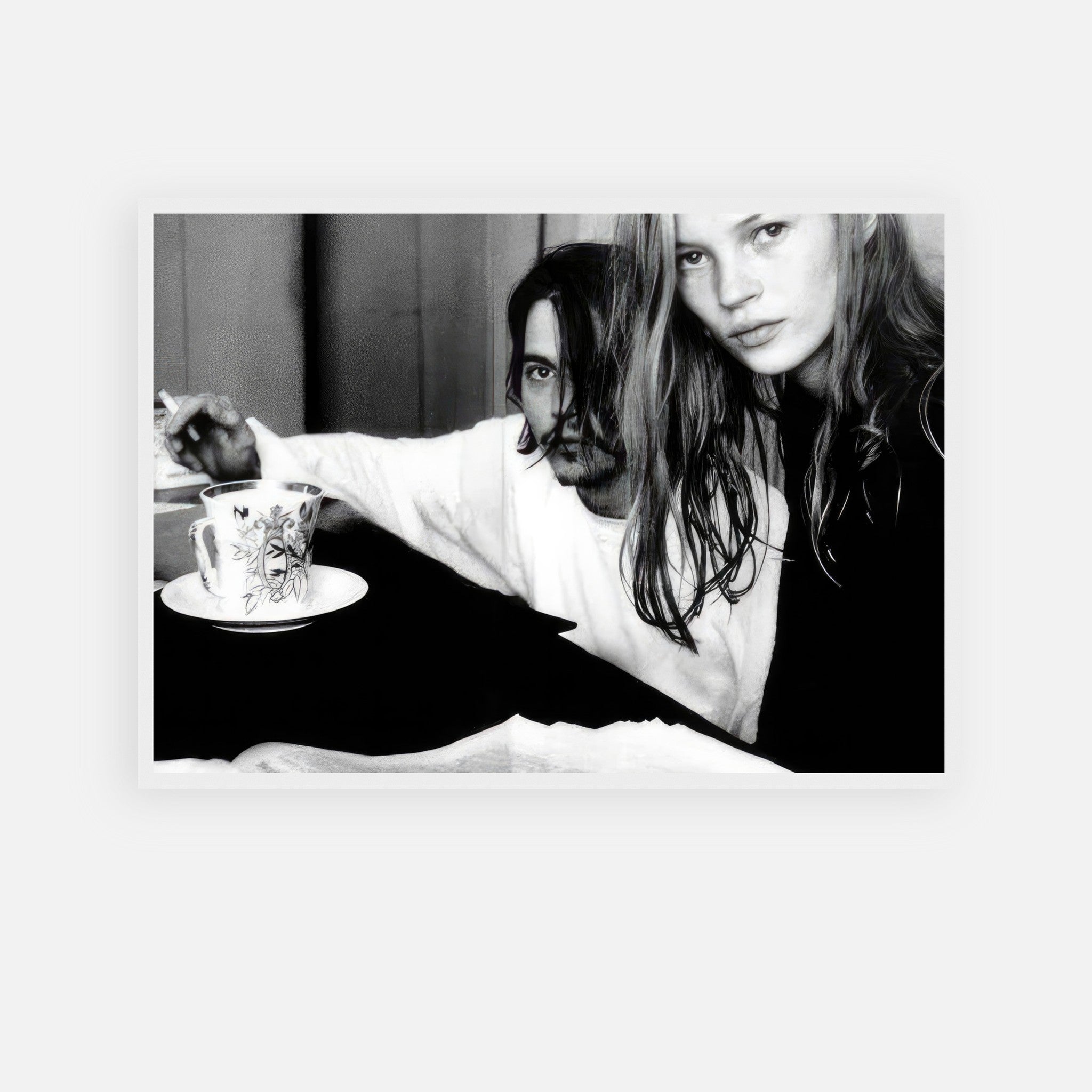 Framed print of Johnny Depp and Kate Moss in black-and-white, capturing 1990s rebellious romance.
