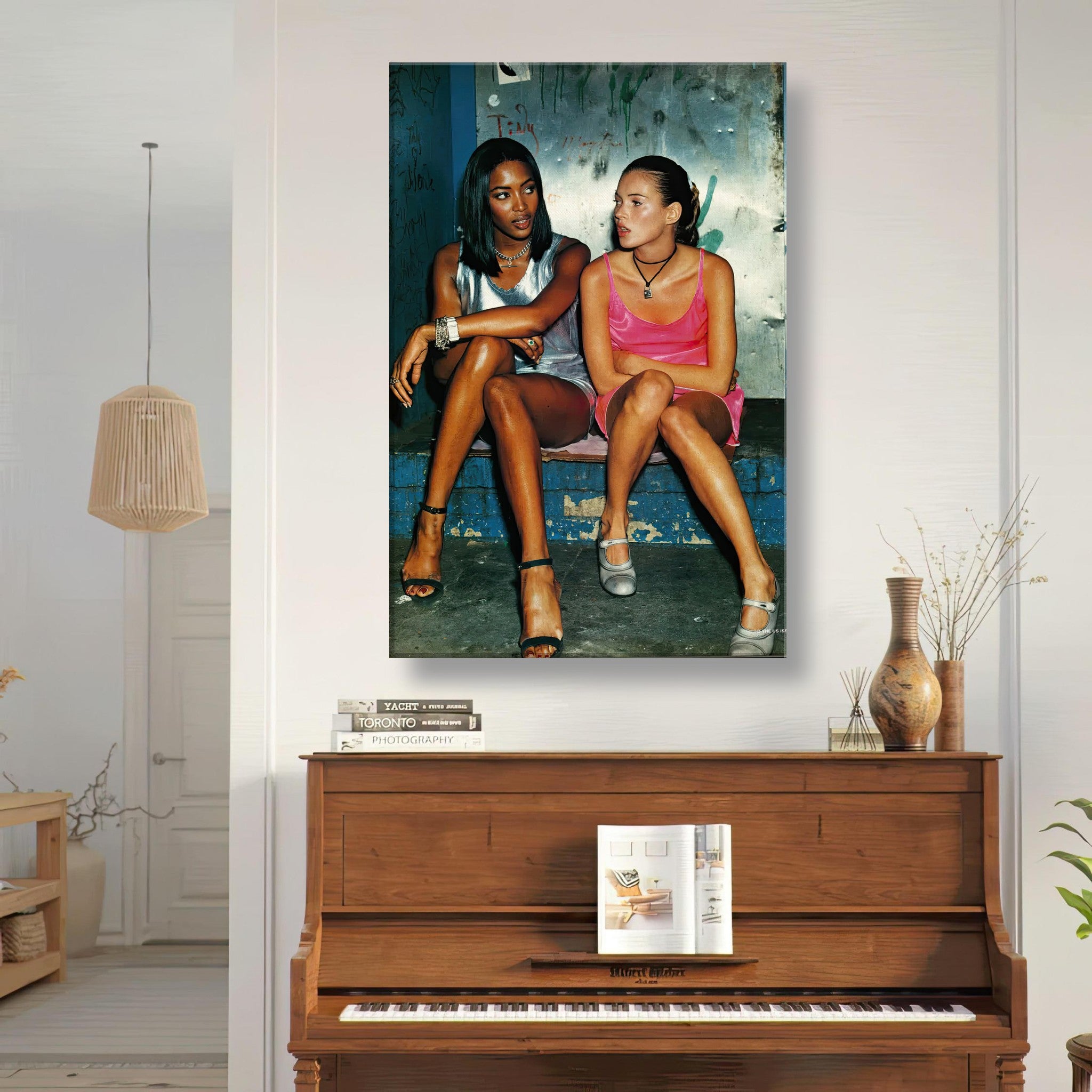 Naomi Campbell and Kate Moss canvas print in a chic living room setting, showcasing 90s fashion icons.