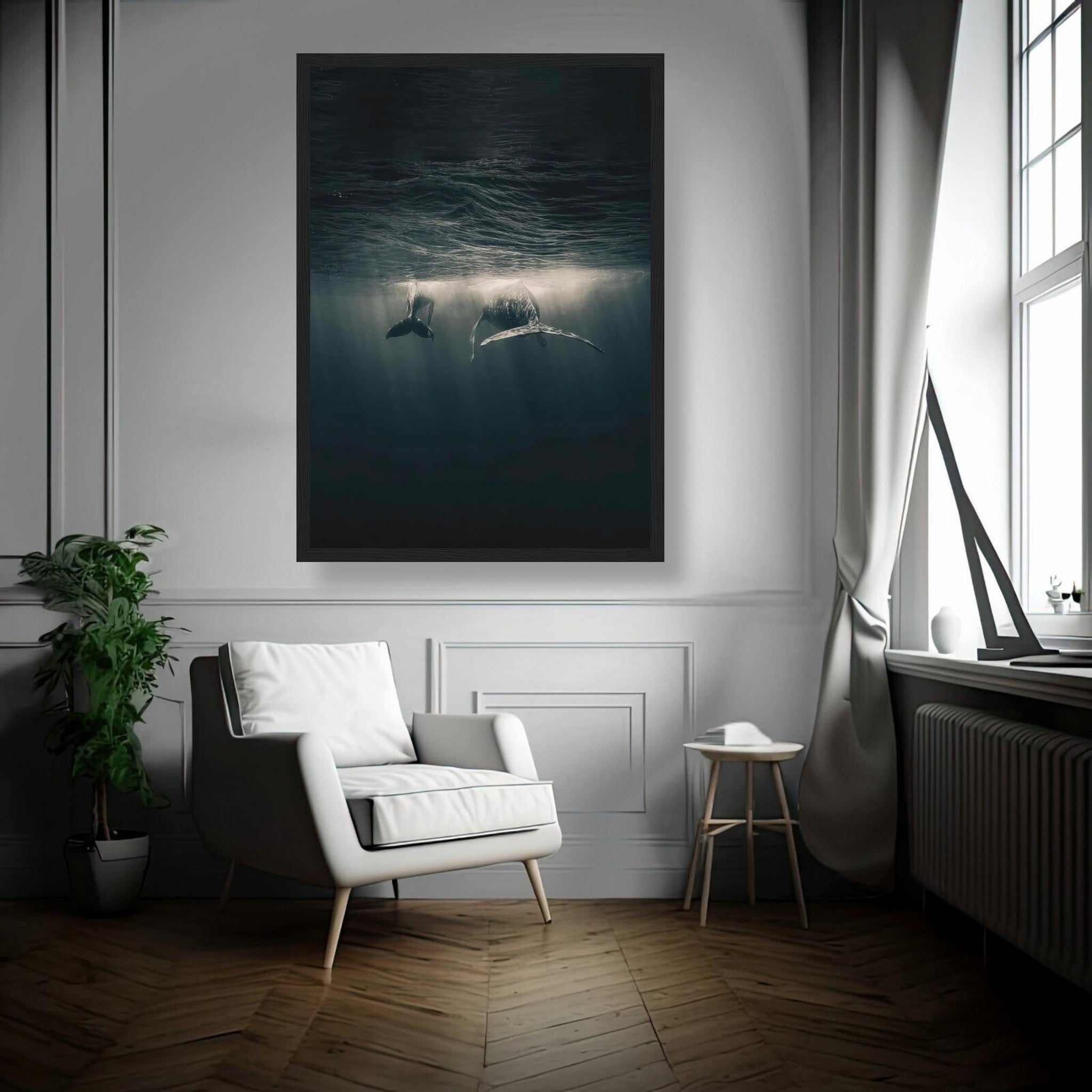 Framed print of two whales swimming underwater, showcasing the beauty of ocean life in a stylish interior setting.