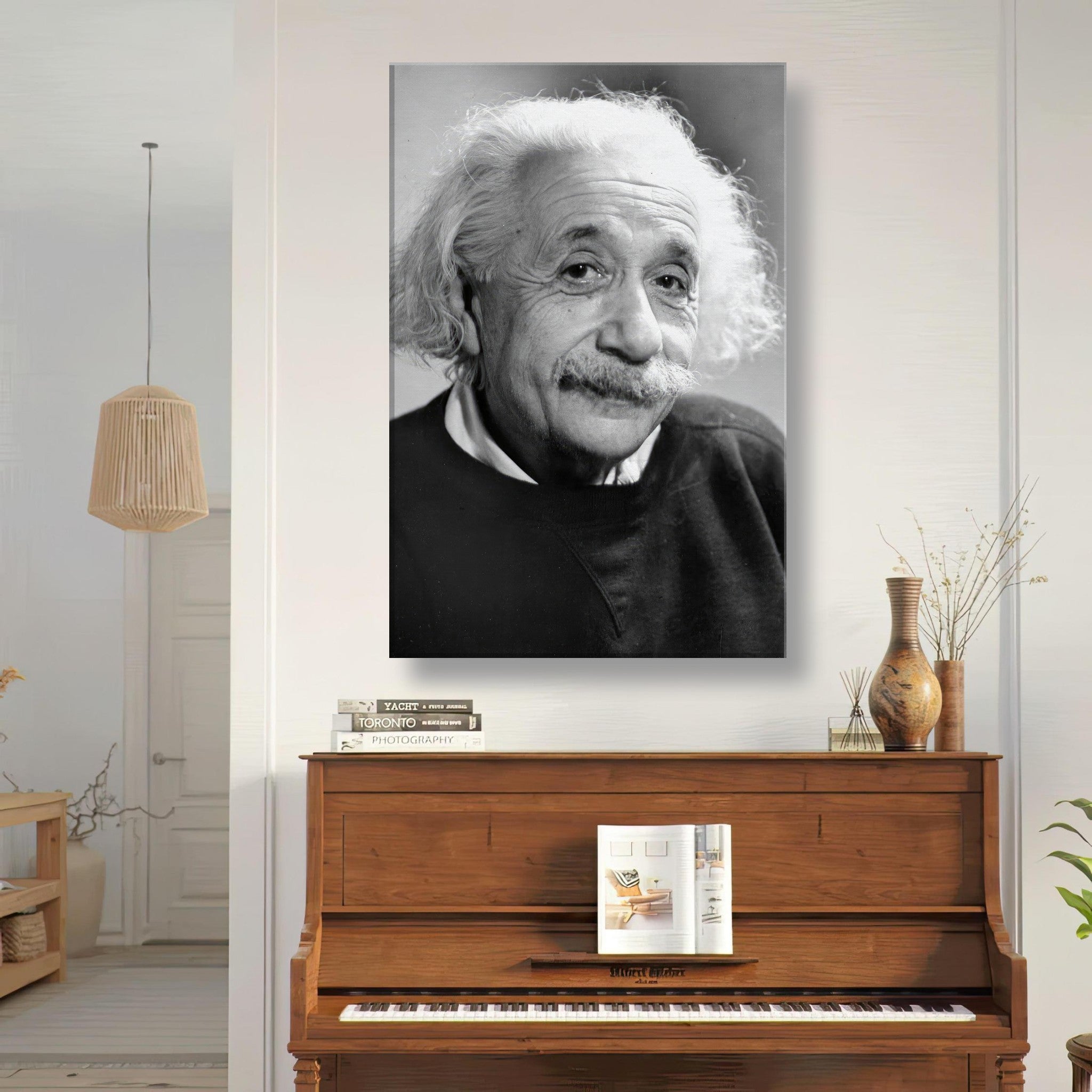 Black and white canvas print of Albert Einstein (1946) displayed in a cozy living room setting.