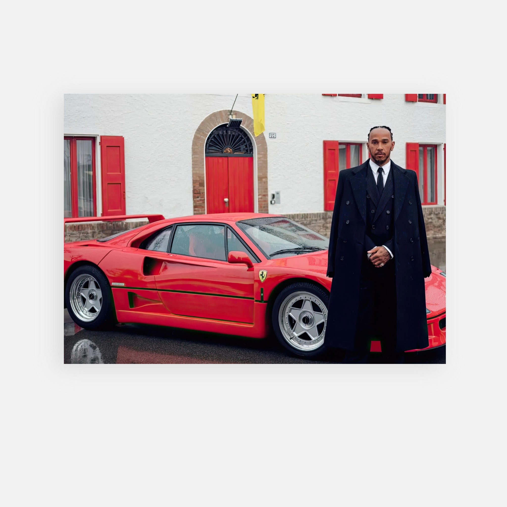 Lewis Hamilton standing by a red Ferrari F40, showcasing automotive excellence and style in a stunning poster.