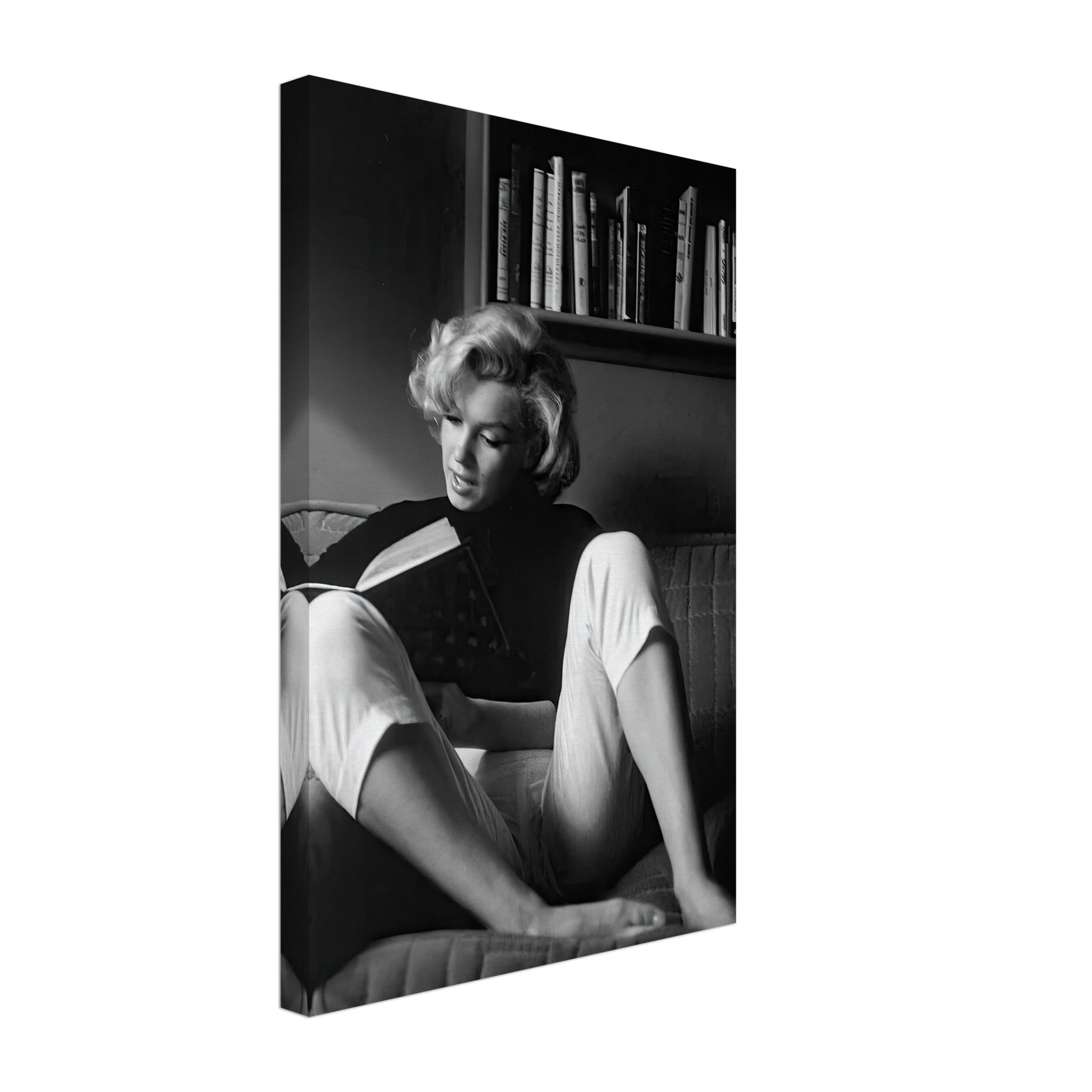 Marilyn Monroe reading at home canvas art in black-and-white, showcasing elegance and intimacy.