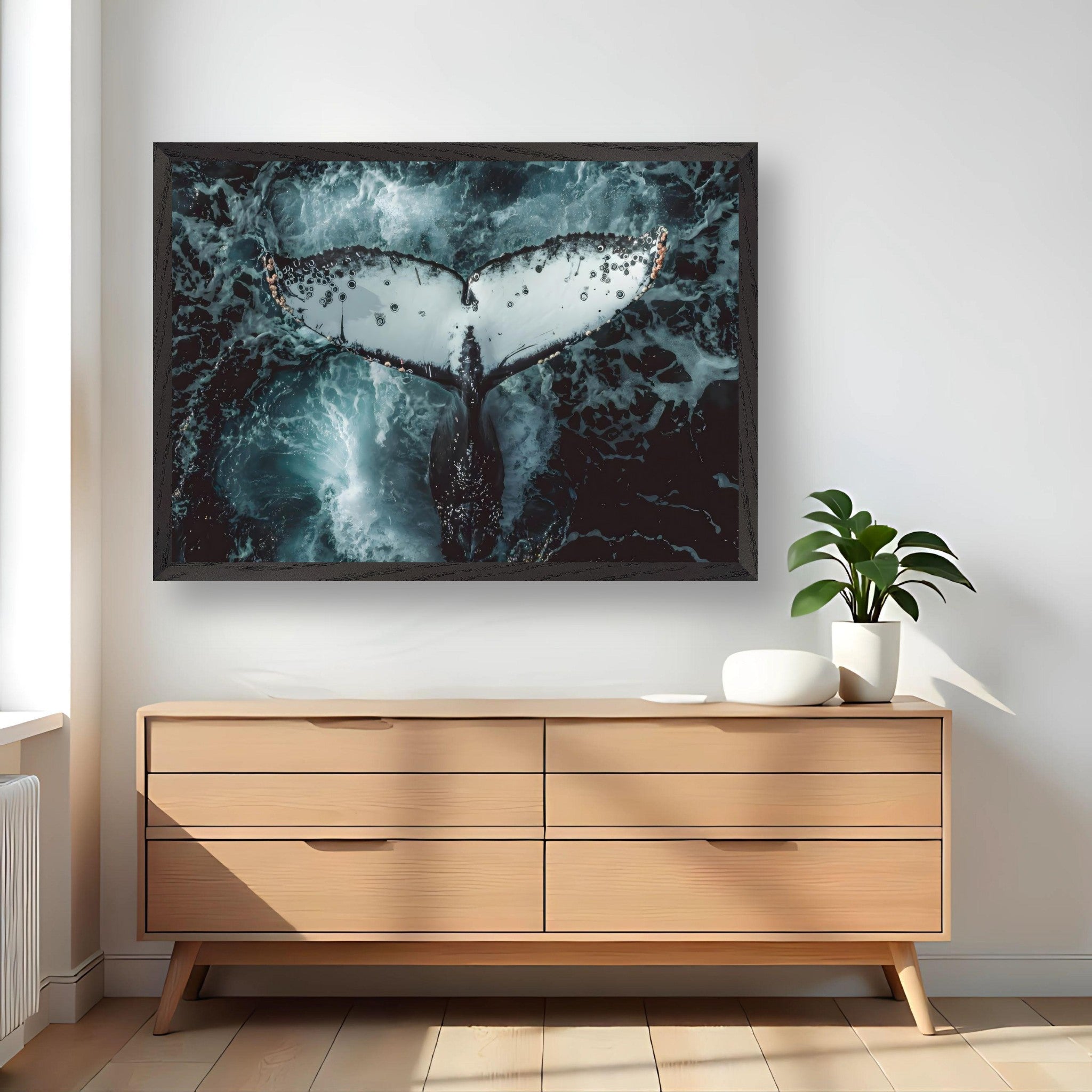 Humpback whale vintage framed art displaying a majestic tail above ocean waves in a stylish home setting.