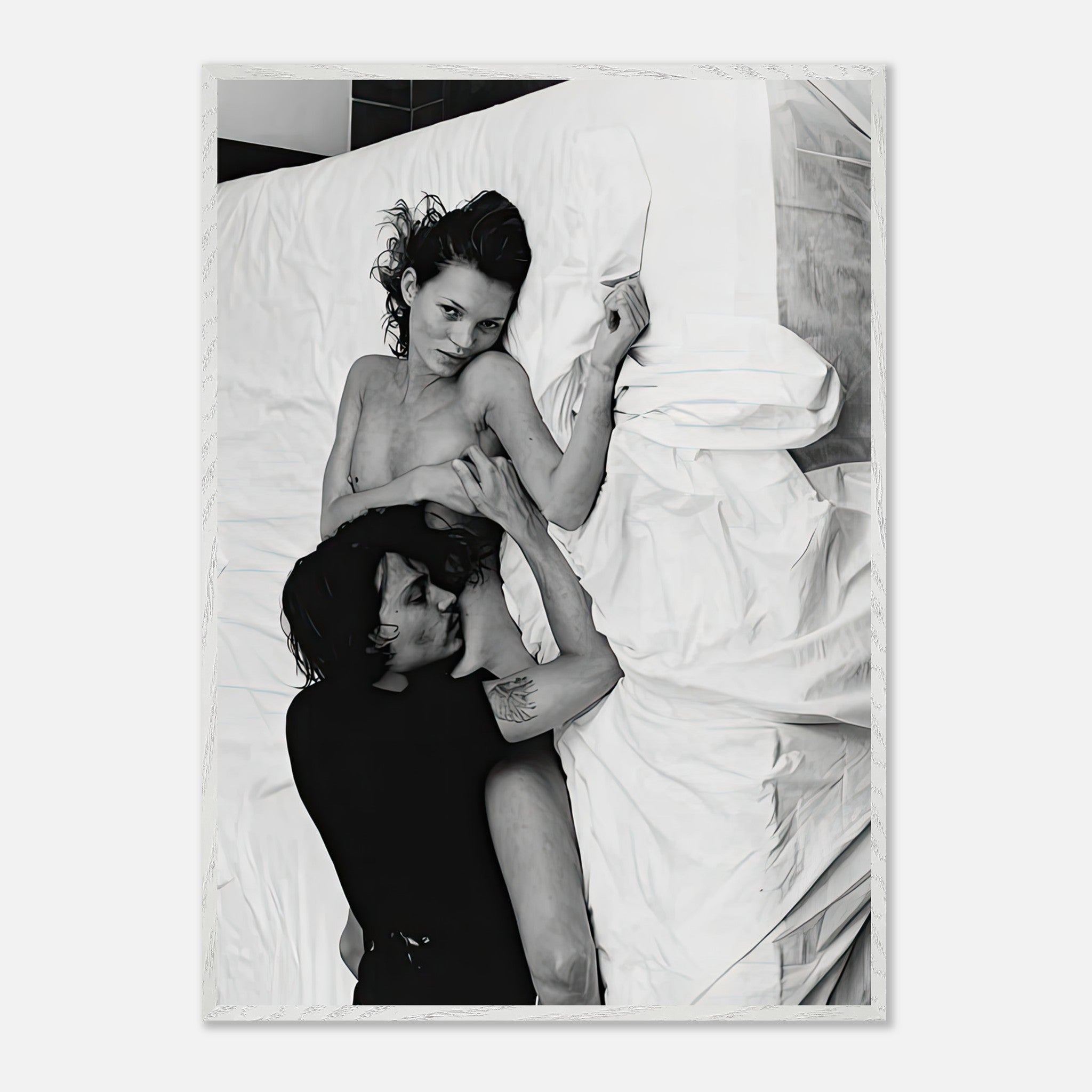 Fine art print of Kate Moss and Johnny Depp in a passionate embrace, shot by Annie Leibovitz, capturing 1994 pop culture.