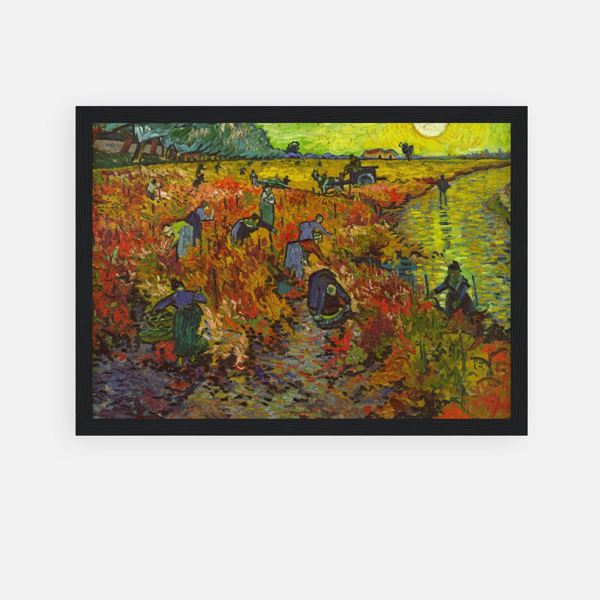 Framed print of Van Gogh's The Red Vineyard, depicting harvesters in vibrant autumn colors.