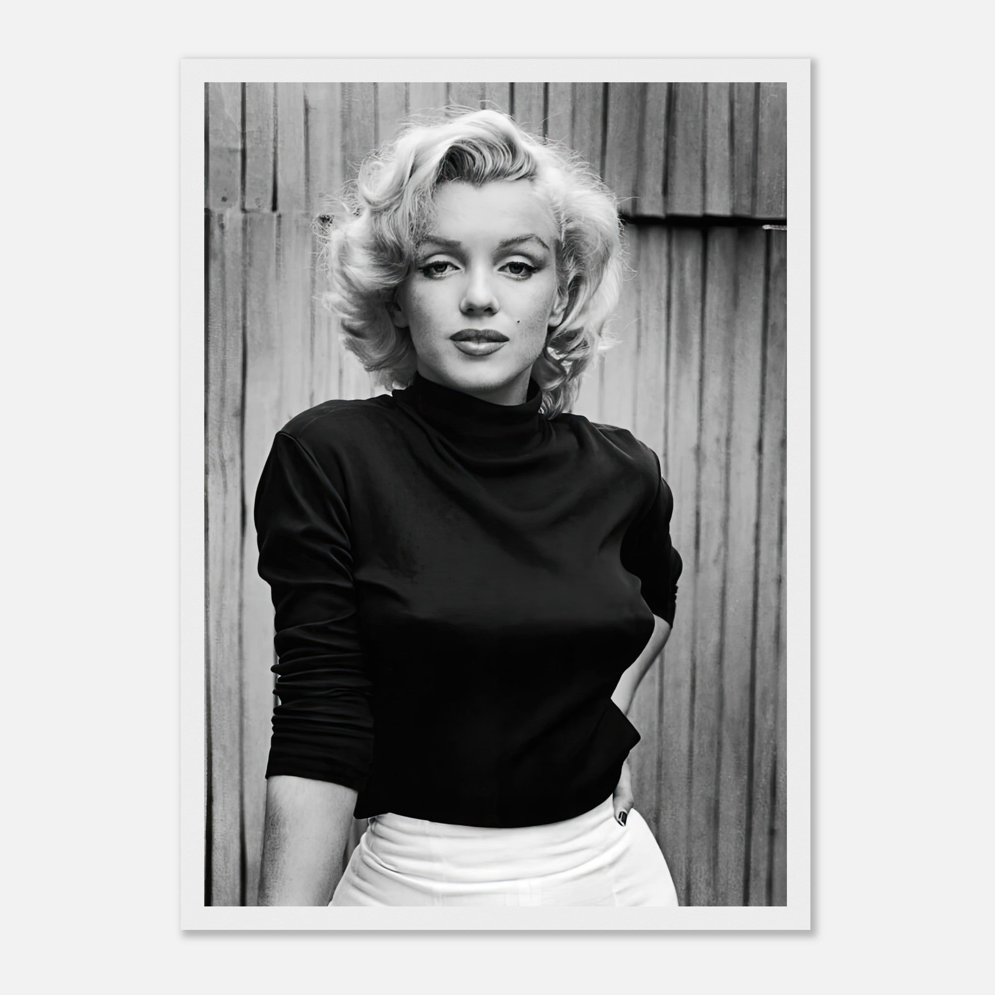 Framed print of Marilyn Monroe's iconic portrait in black-and-white, showcasing her timeless beauty and Hollywood glamour.