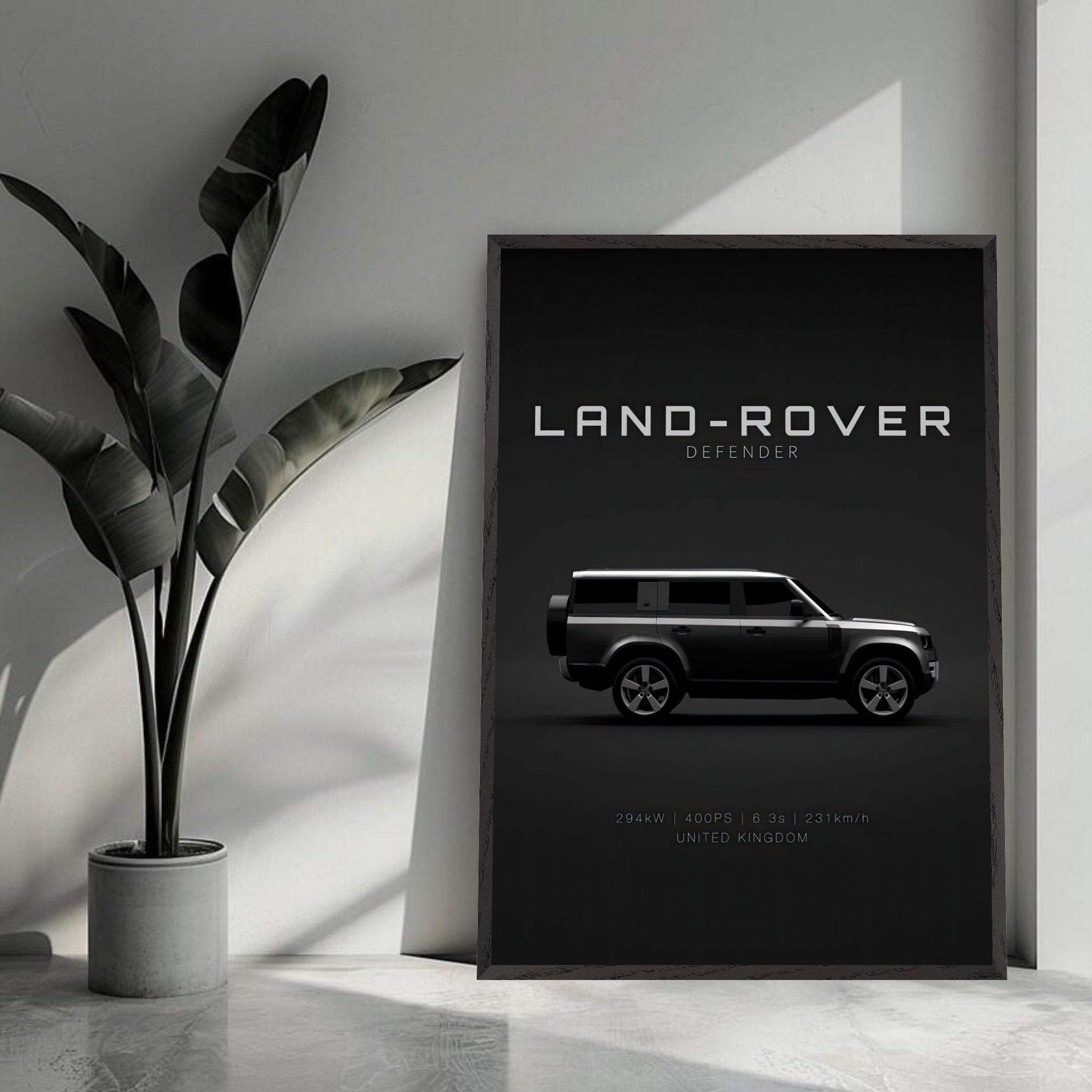 Vintage Land Rover Defender framed art print on a dark background with modern interior decor.