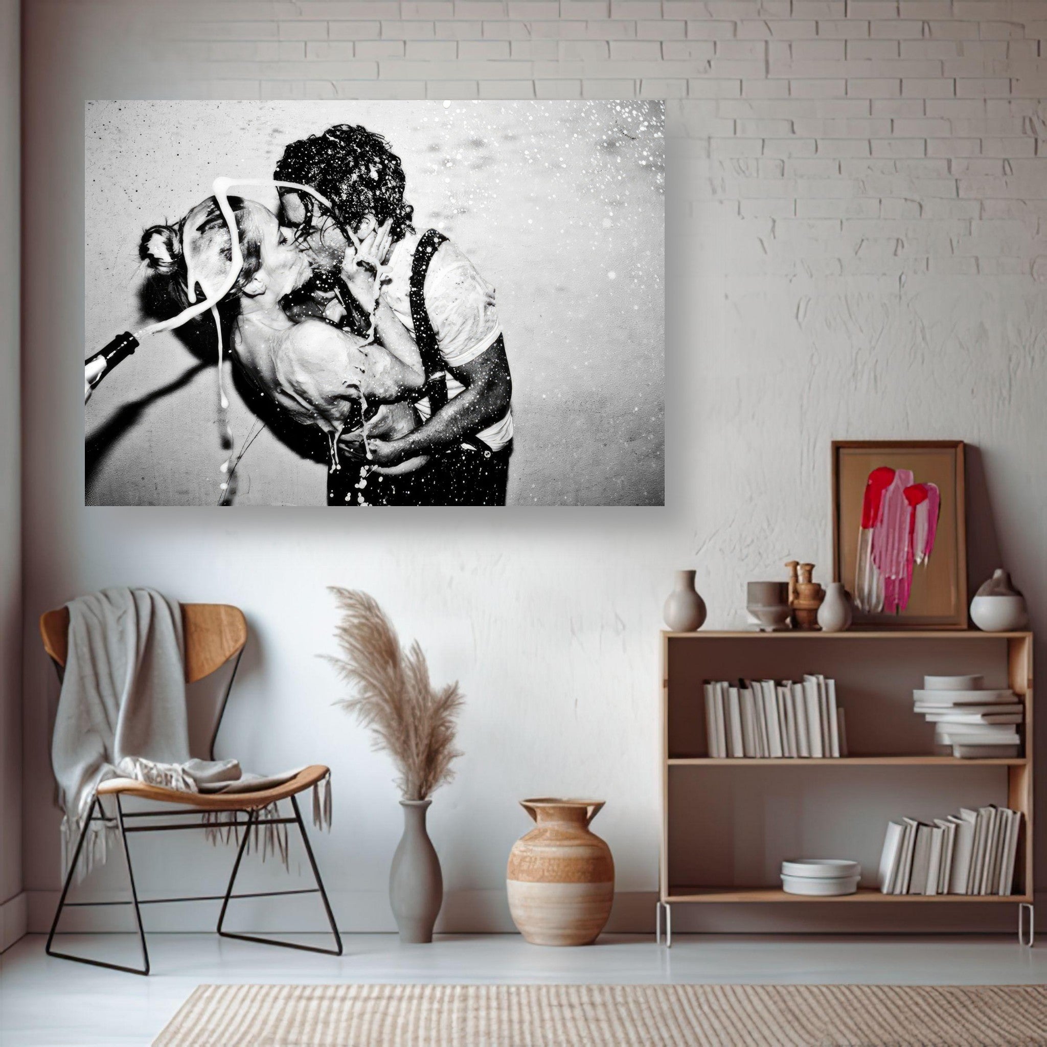 Black-and-white metal print of Johnny Depp and Kate Moss sharing a passionate kiss, surrounded by champagne.