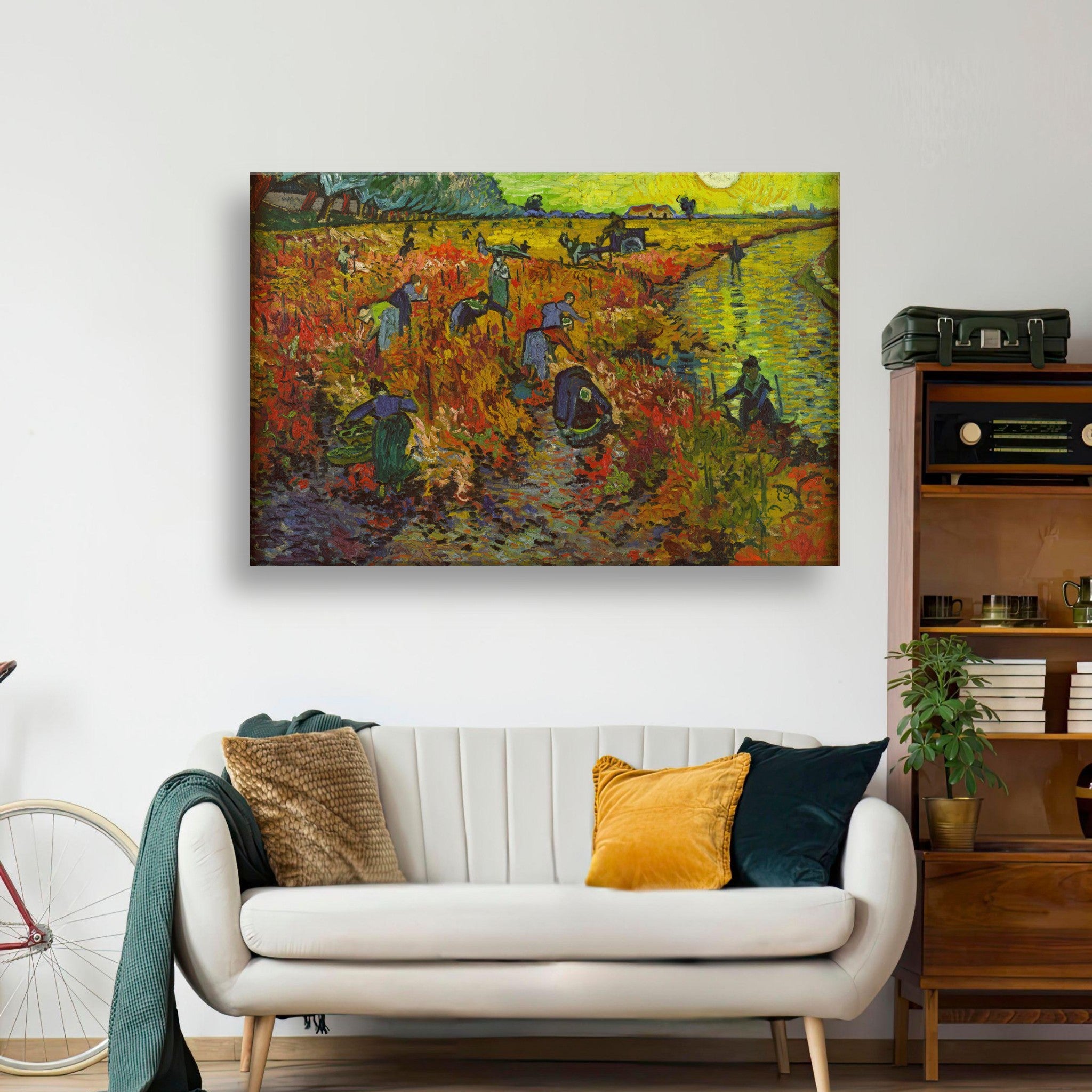 The Red Vineyard canvas print by Van Gogh, showcasing vibrant autumn colors in a modern living room setting.