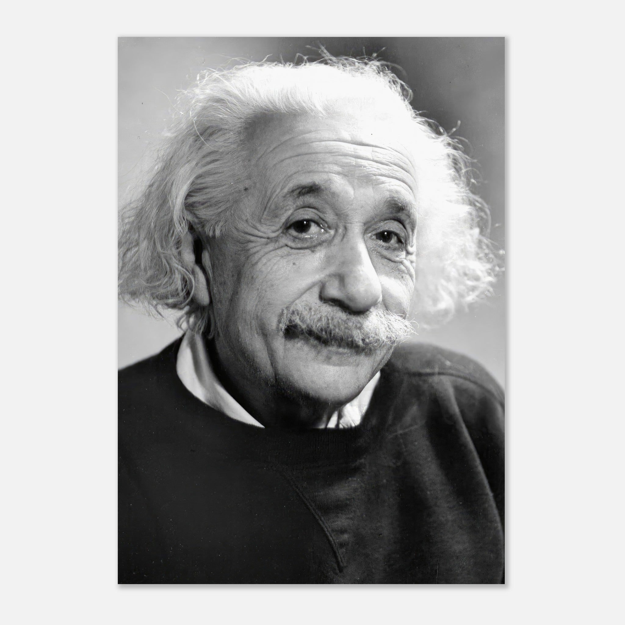 Black-and-white poster of Albert Einstein in 1946, showcasing his iconic wild hair and thoughtful expression.