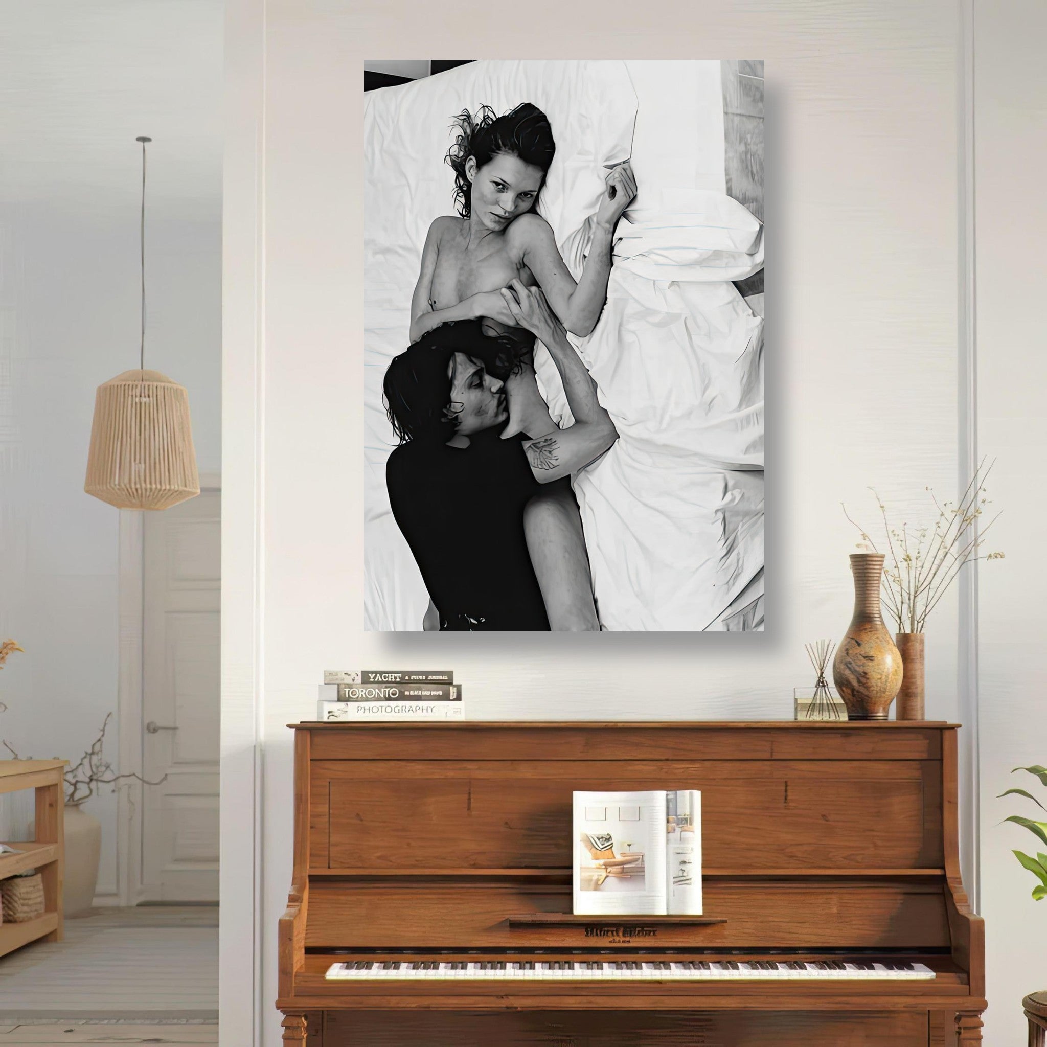 Stunning black-and-white metal print of Kate Moss and Johnny Depp, capturing 1990s romance in a stylish living room setting.