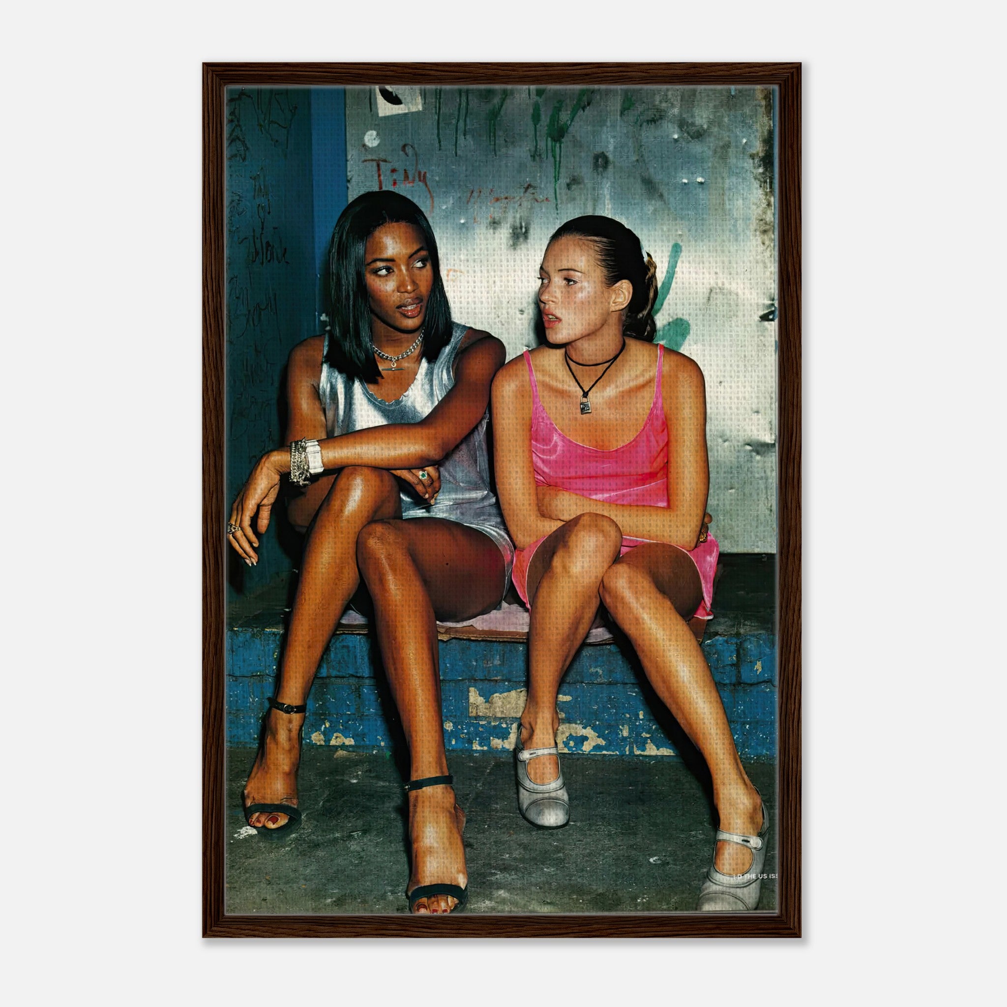 Naomi Campbell and Kate Moss framed canvas print capturing 90s supermodel elegance and casual glamour.