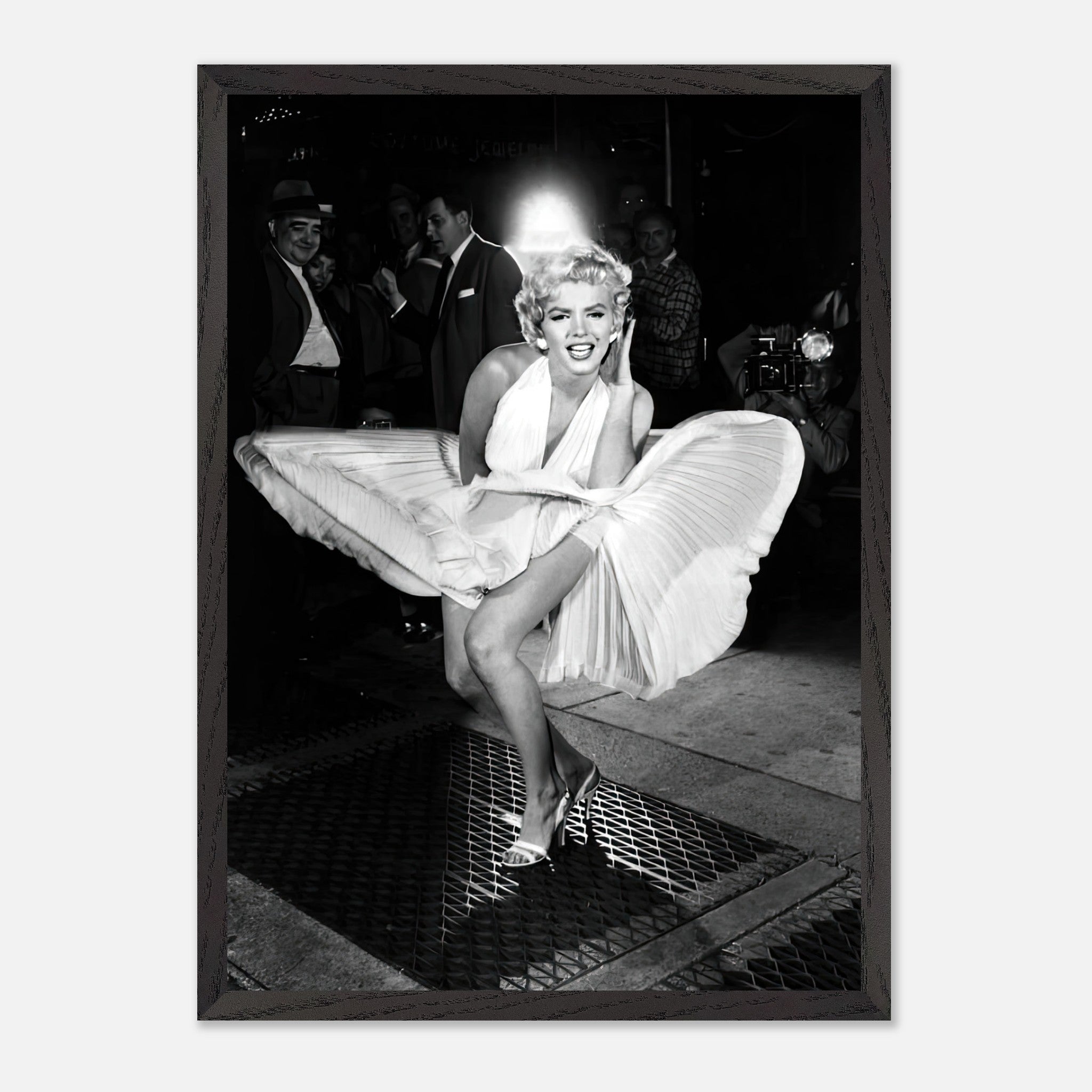 Marilyn Monroe in wind-blown white dress vintage framed print exuding Hollywood glamour and elegance.
