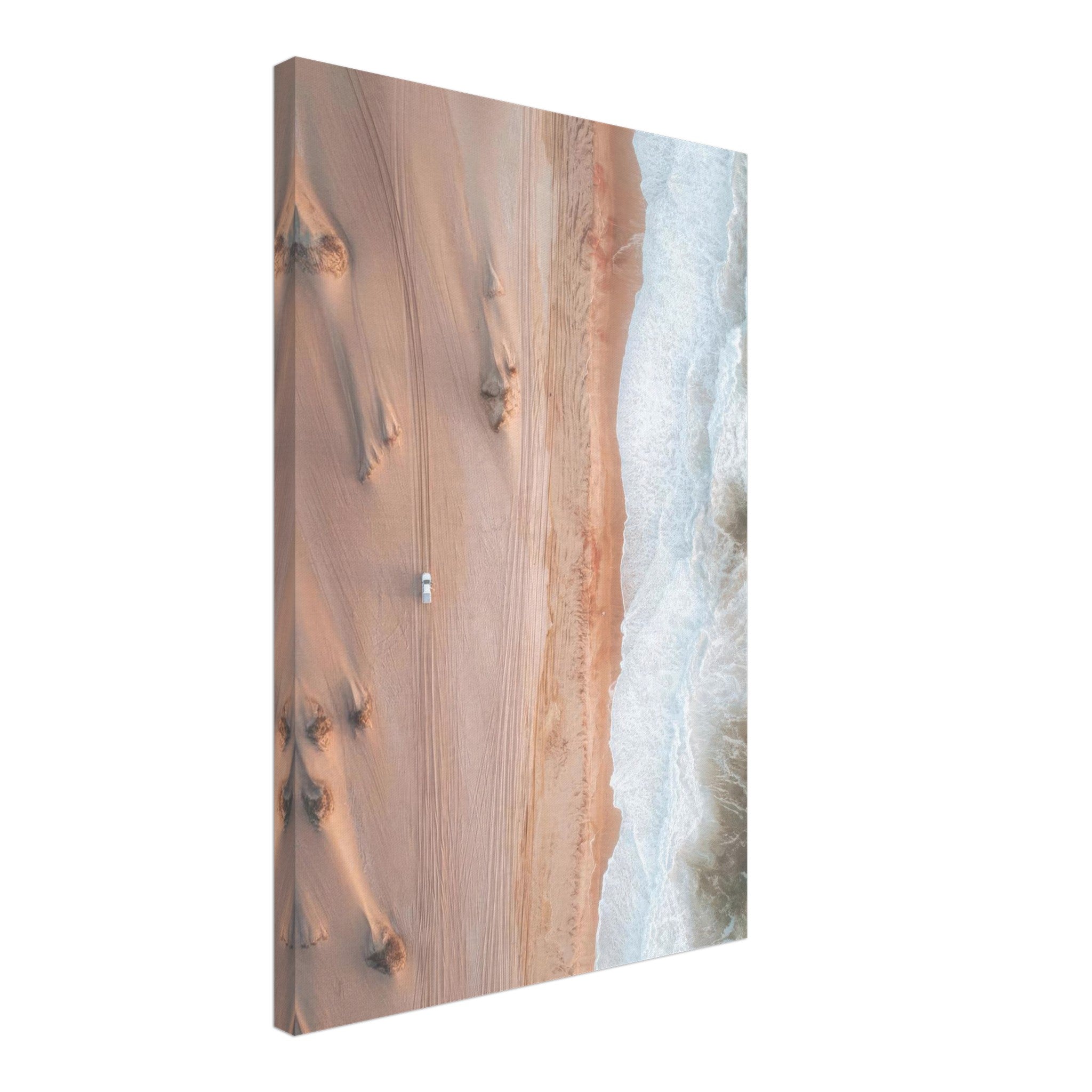 Drone photography canvas print of desert dunes merging with ocean waves, showcasing stunning colors and textures.